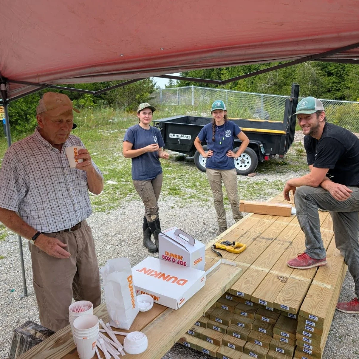 MALT taking care of its hardworking TAM volunteers and Belden Falls bridge repair team with donuts and coffee. Bridge will be closed all week.