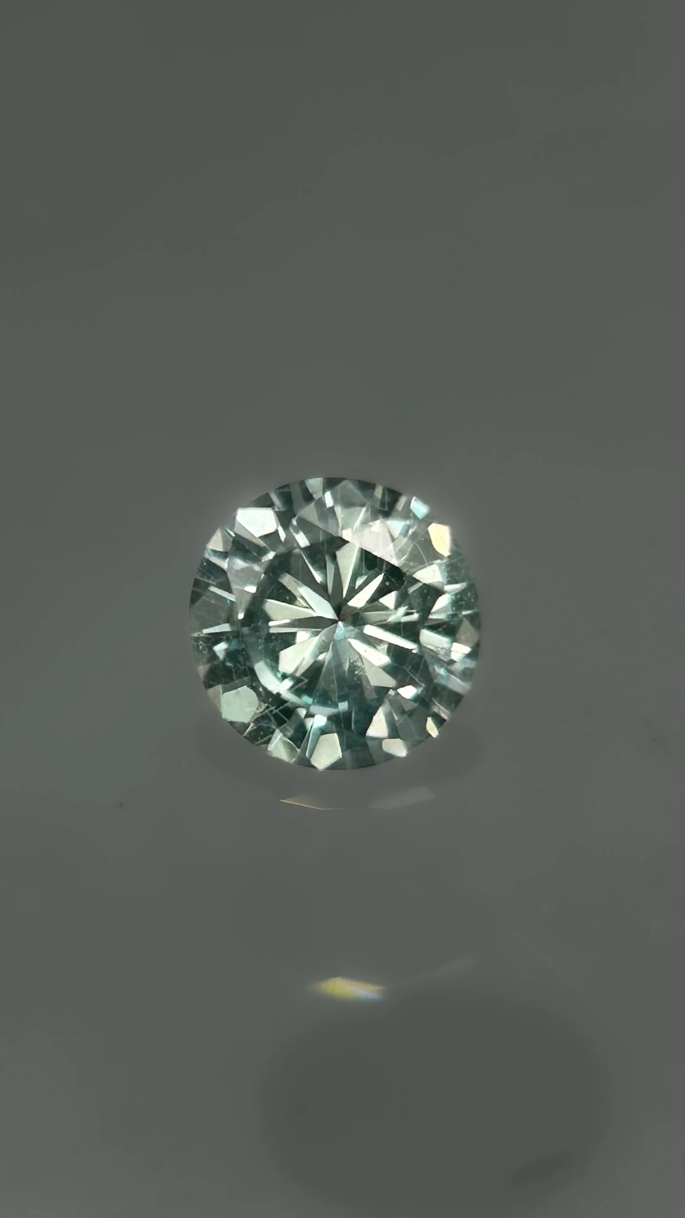 Round Brilliant Teal-Green Sapphire