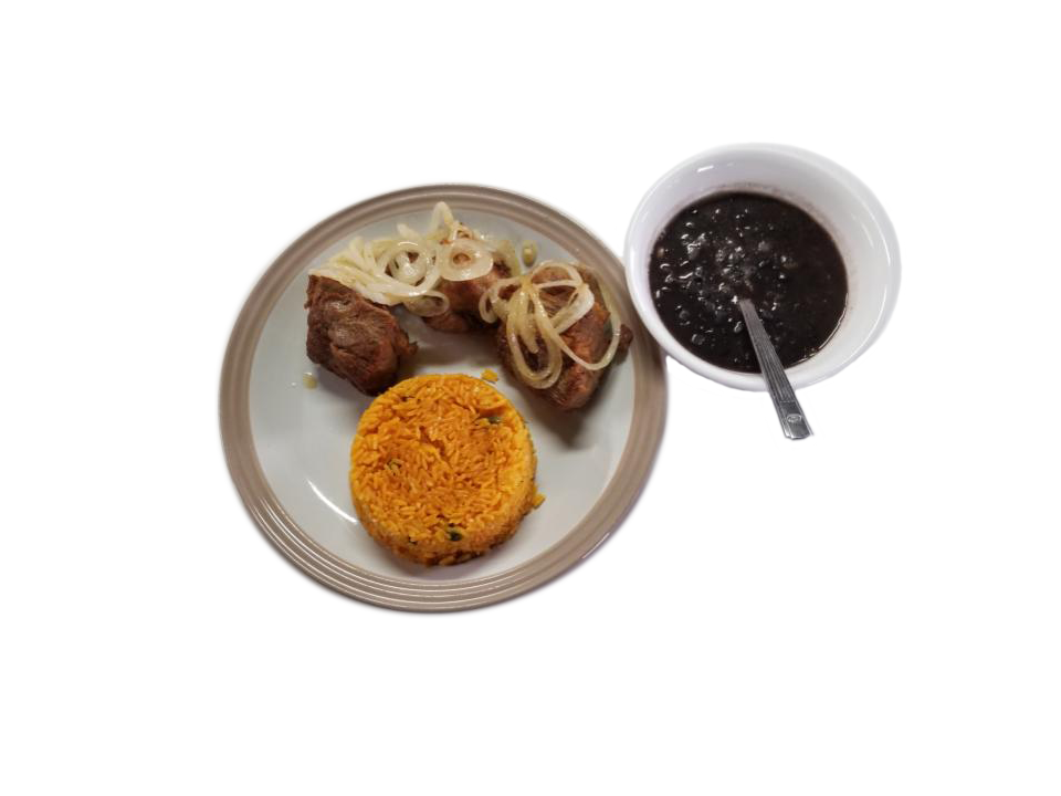 Fried Pork Chunks with Yellow Rice and Black Beans