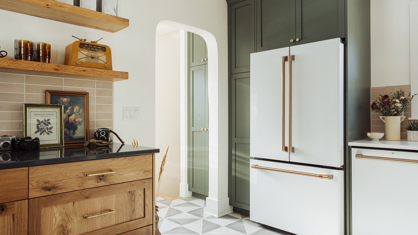 An arched pass through, color, and pattern brought charm back to this 1928 mill house kitchen. New cabinetry added smart storage and functionality. Swipe to see the before.

Photo by @gallivancreative 
Contractor: @cory_a_vroom_construction_llc 
Cabi