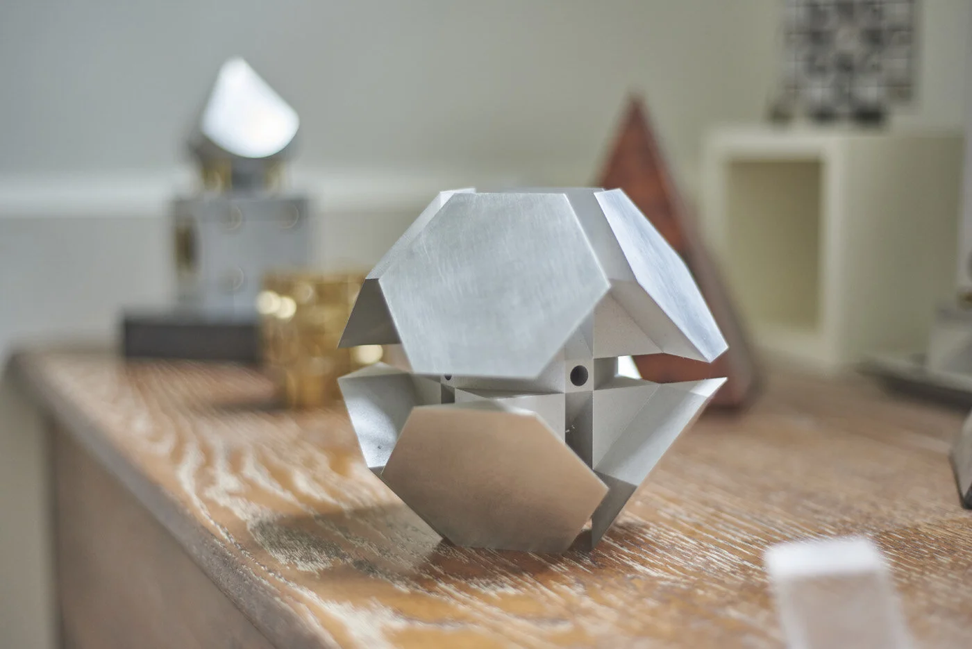  close up view of desktop geometric sculpture designed by Hamptons architect Ernest Schieferstein 