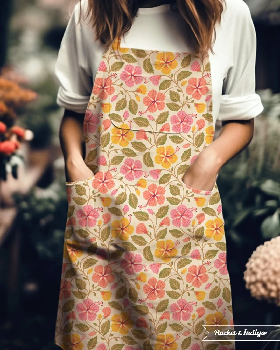 🌺 Hibiscus Garden 🌺 A new print just launched in my Spoonflower shop in a variety of colorways. The one shown is my absolutely favourite in sunny yellow, peach and pink on a vintage cream background. Aprons and cushions sprang to mind for this flor