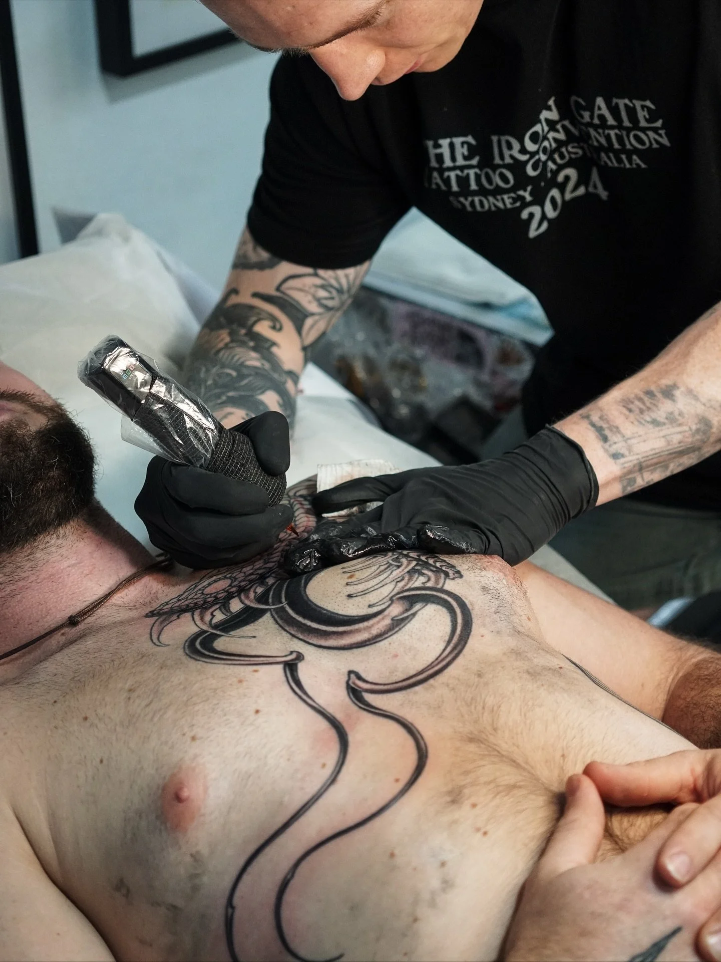 Caught up with the master of precision, @garethtattoos, to watch him go through the motions on this beauty. Gareth&rsquo;s work is all about those crisp lines and buttery smooth blends of black and grey that bring his pieces to life, it&rsquo;s great