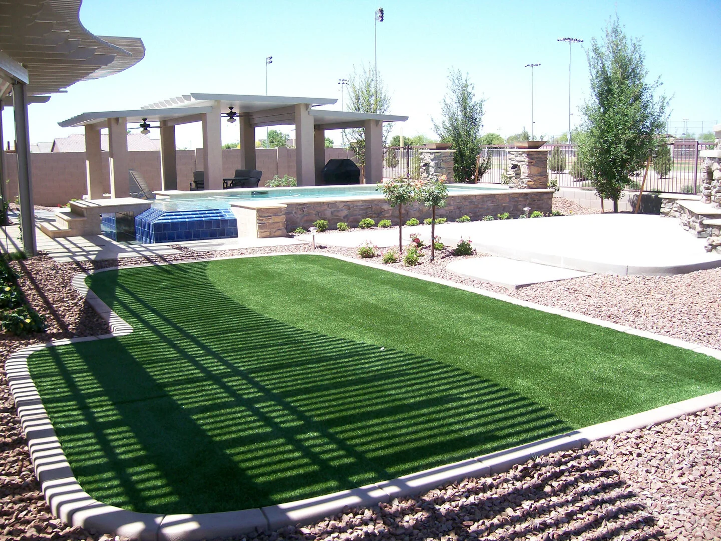 Discover the Benefits of Artificial Grass Around Pools