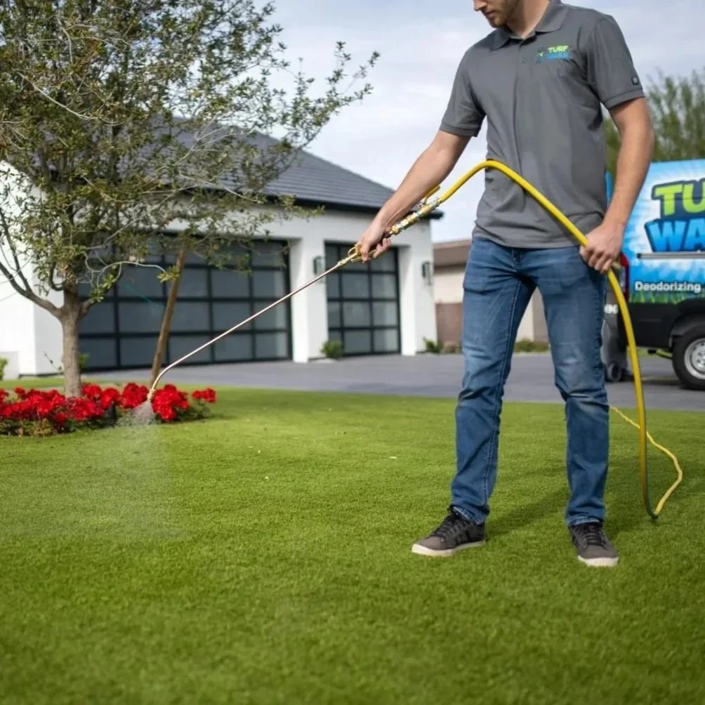 High-quality playground artificial turf in Phoenix showing durable green fibers and safety cushioning designed to withstand intense desert heat.