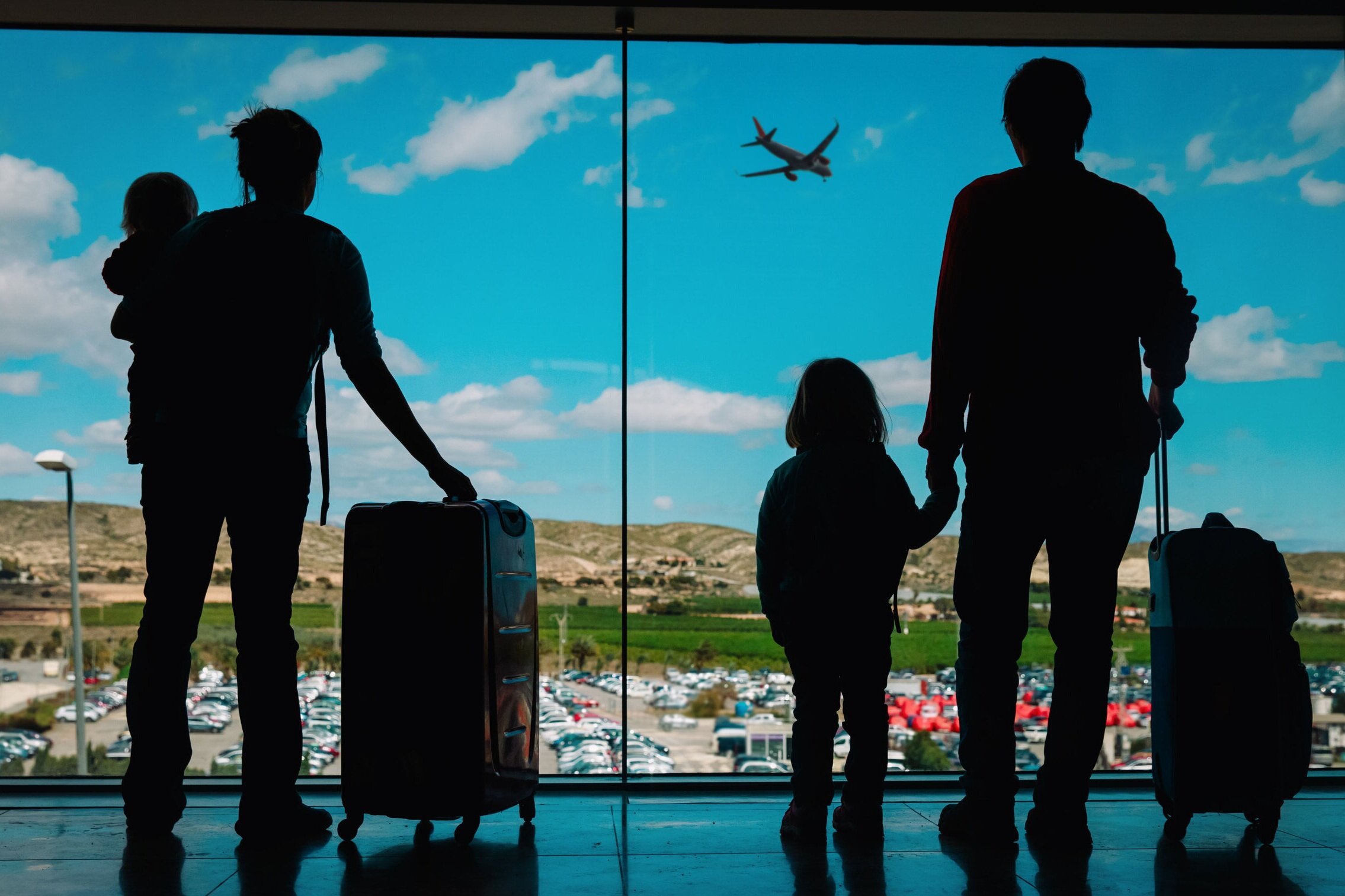 family with suitcases.jpg