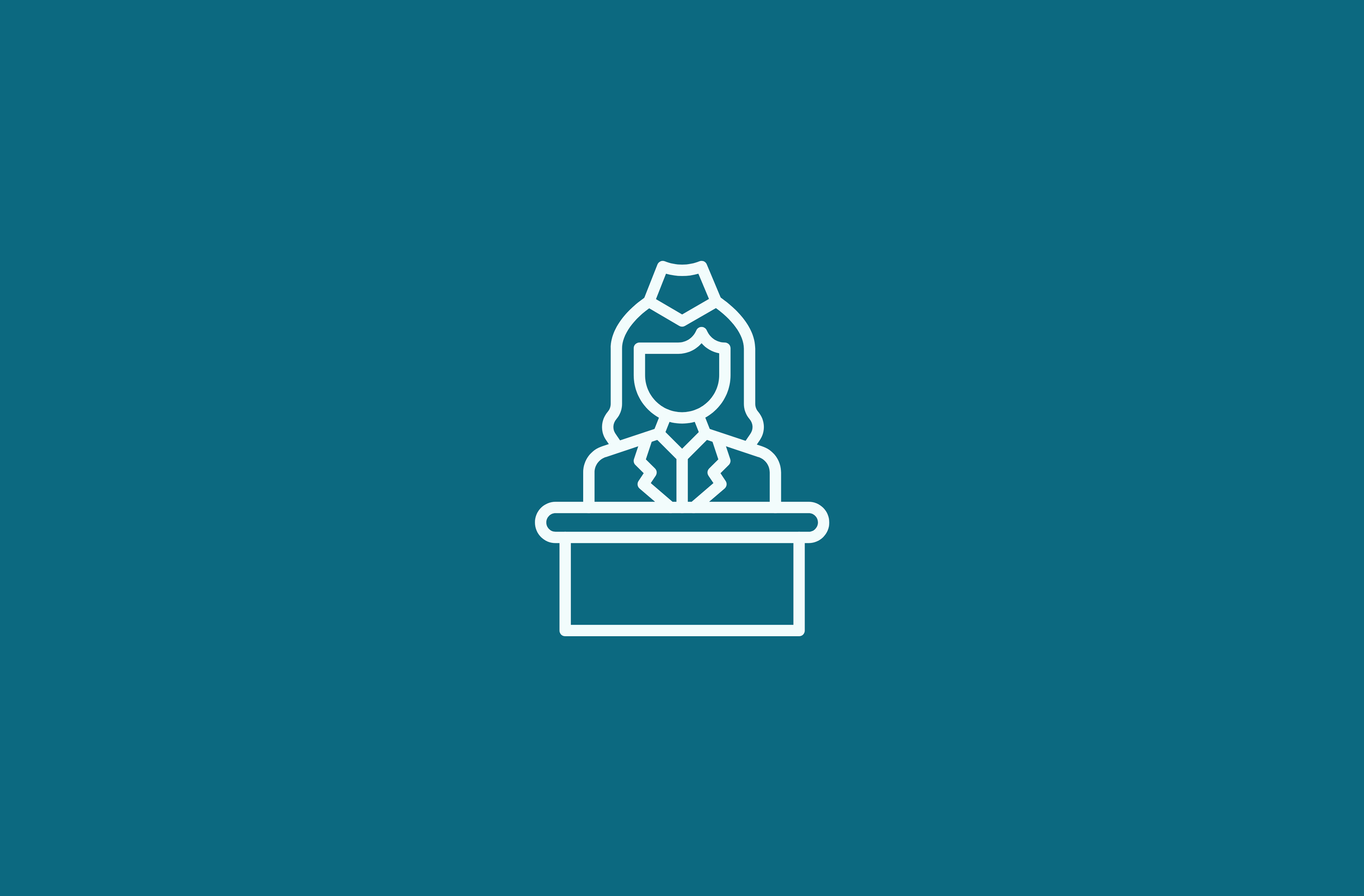 Icon of a woman sitting at a desk, representing a customer service or support representative.
