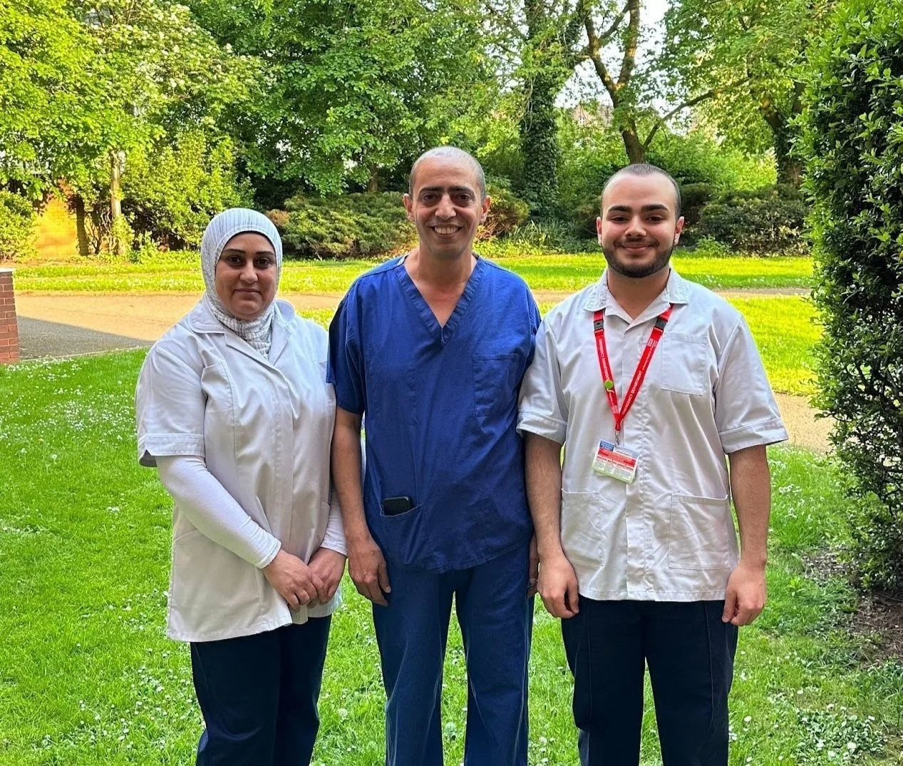 A picture of the Mayali family: the father, son, and wife.