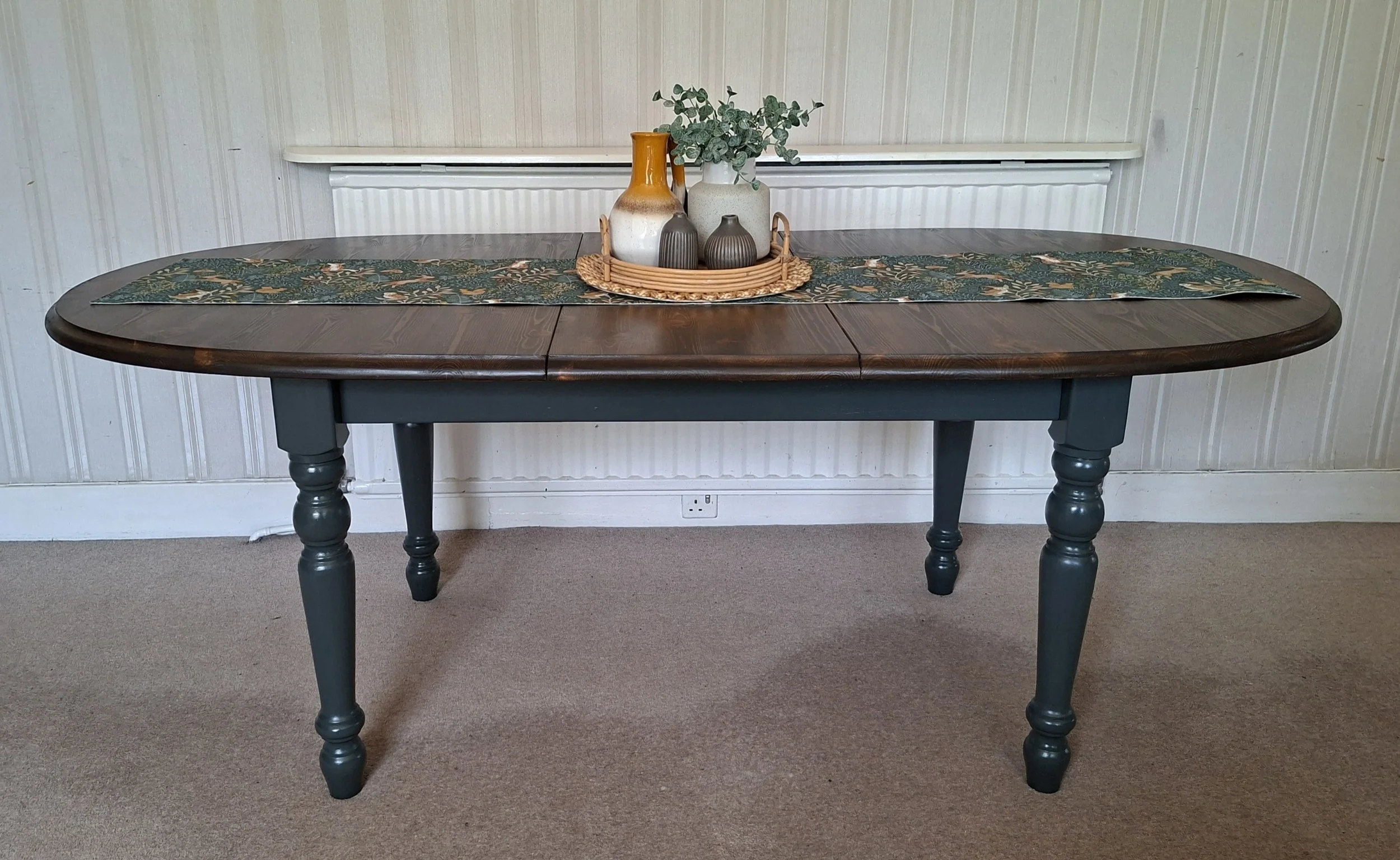 Studio green painted pine table with walnut stained top