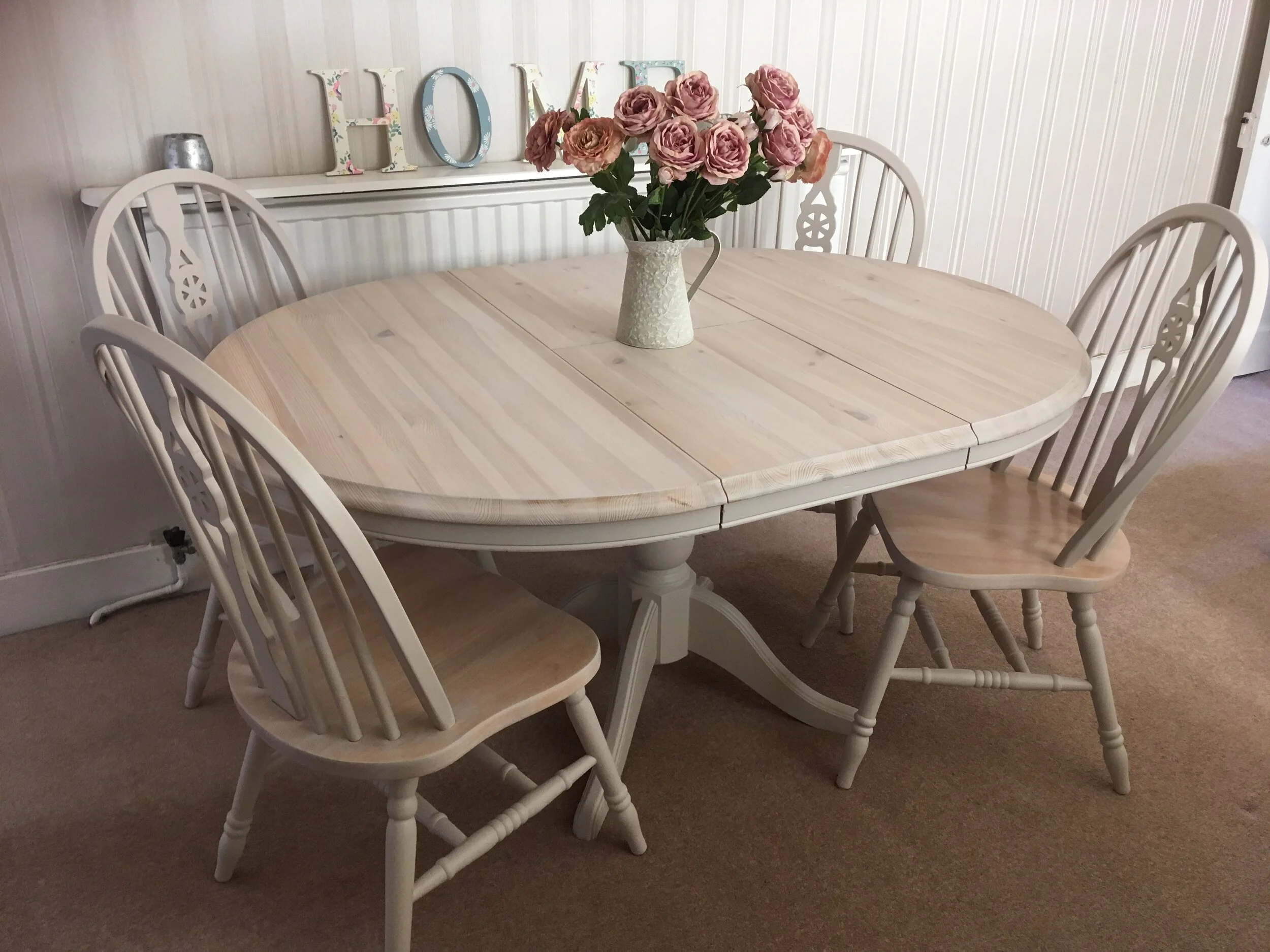 lime waxed round extendable table and chairs