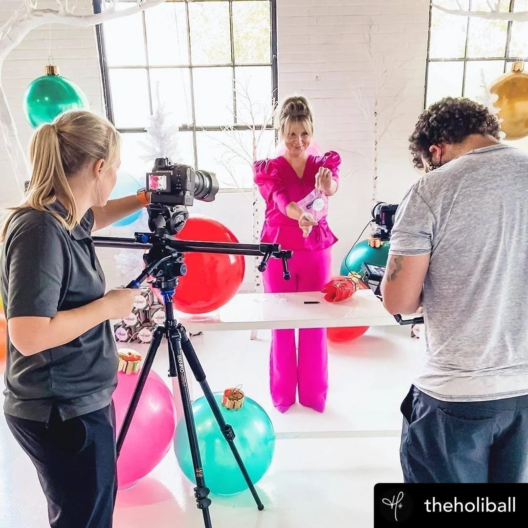 Flash Forward video crew filming a colorful commercial production with multiple cameras and studio lighting with Holiball.