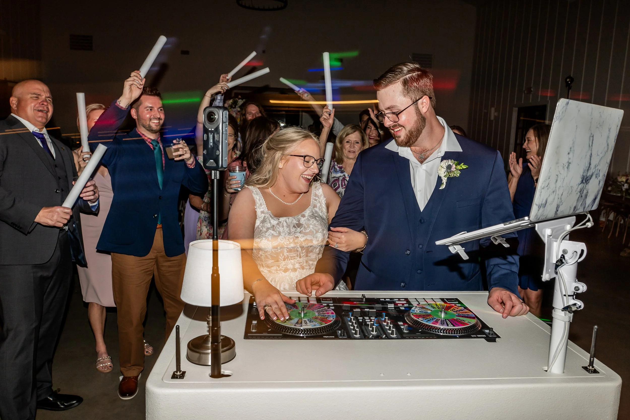 Wedding reception at Still Waters Ranch in Texas with DJ Danny B and couple dancing with guests on a high energy dance floor