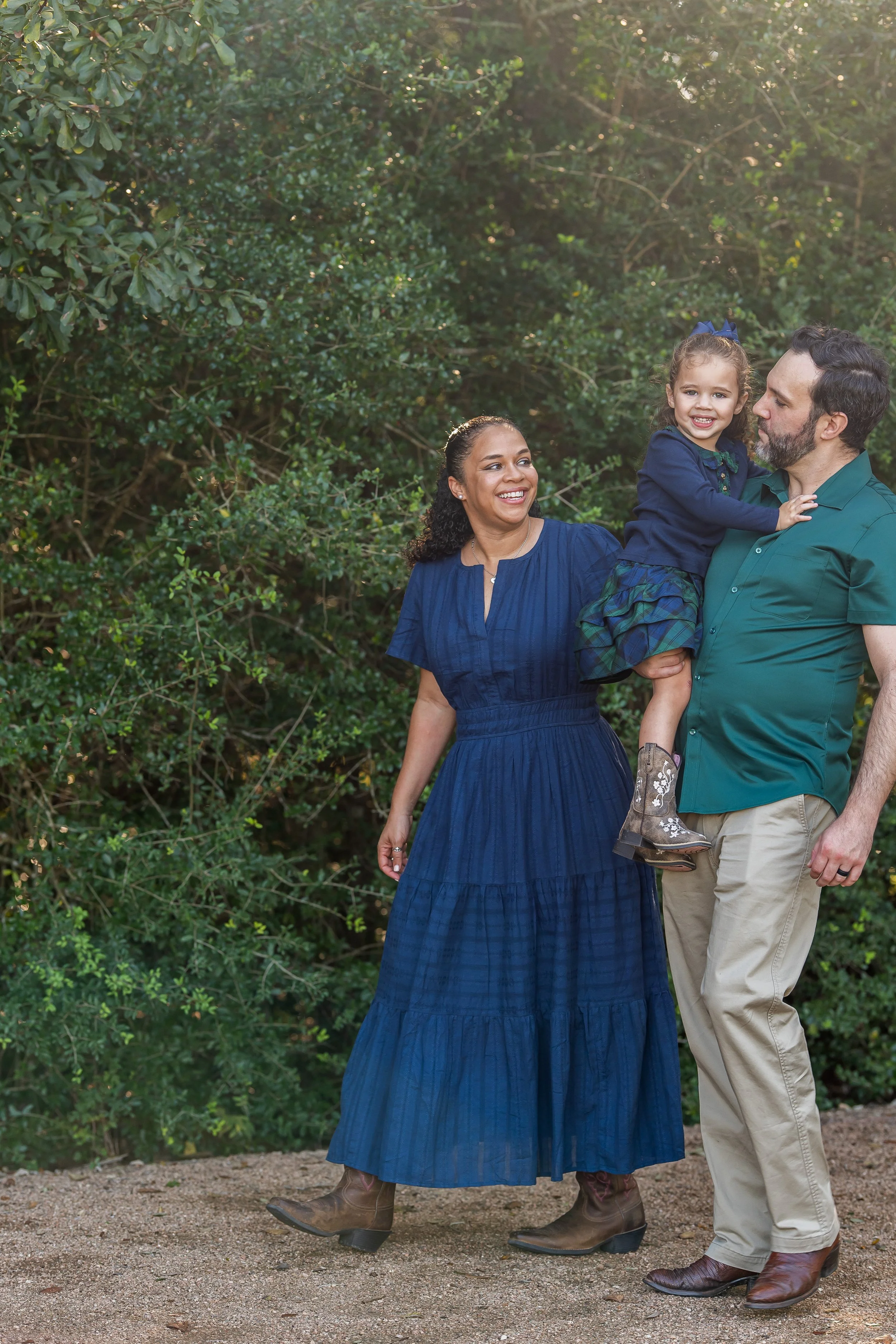 Candid family walking photo at Challenger Park in Webster Texas during spring session