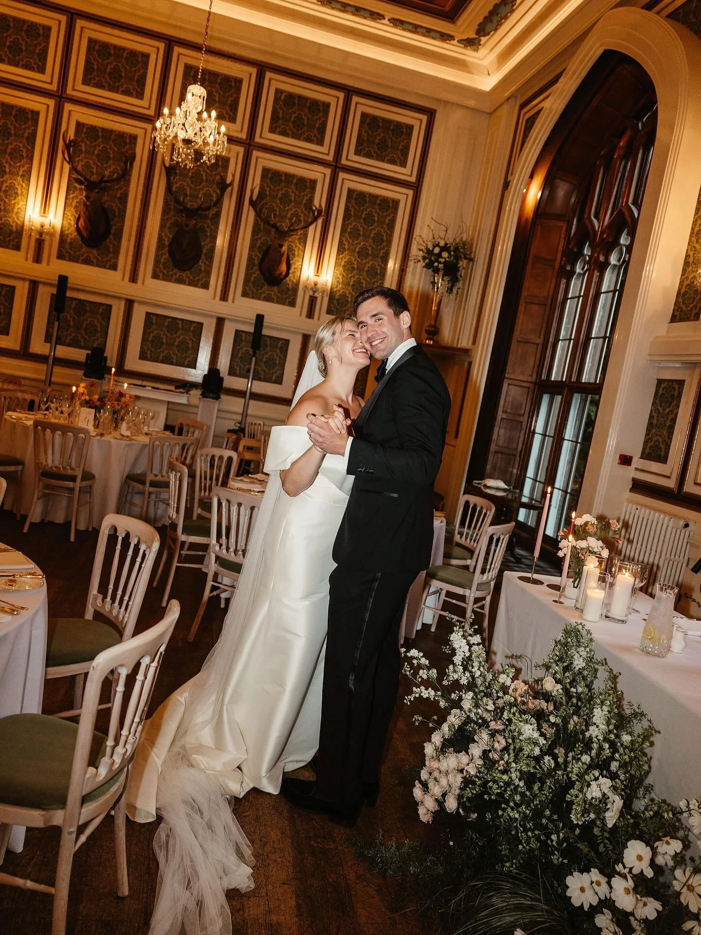 Julia & Vlad embracing the Ballroom before guests take their seats🤍✨
.
.
.
📸: @emmalawsonphoto 
💐: @fauna_flower_folk 
.
.
. 
#drumtochtycastle #weddingvenue
#scottishweddingvenue #castlewedding #exclusivehire
#weddingday #luxurywedding