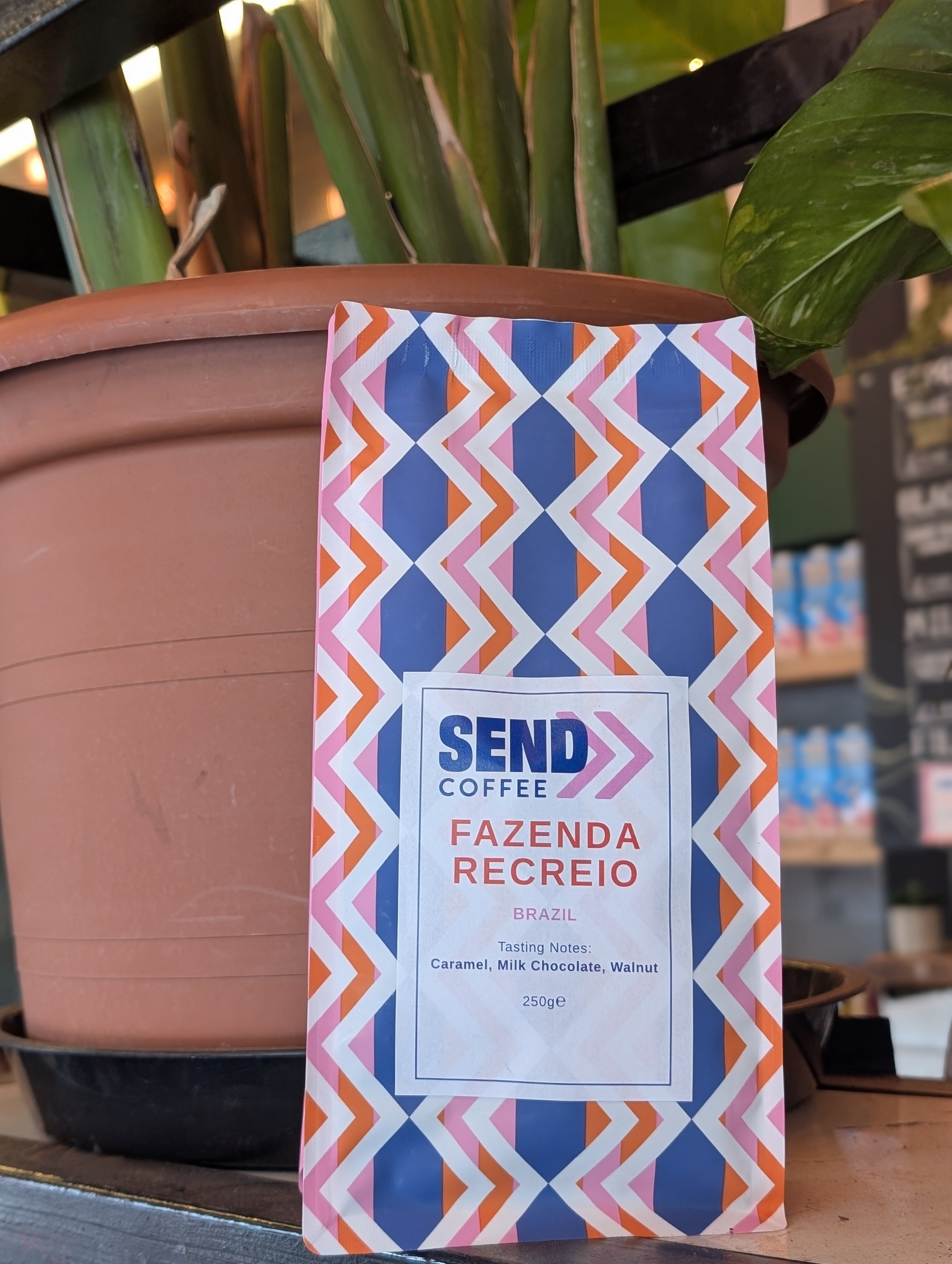 An image showing a bag of coffee beans at a coffee shop 