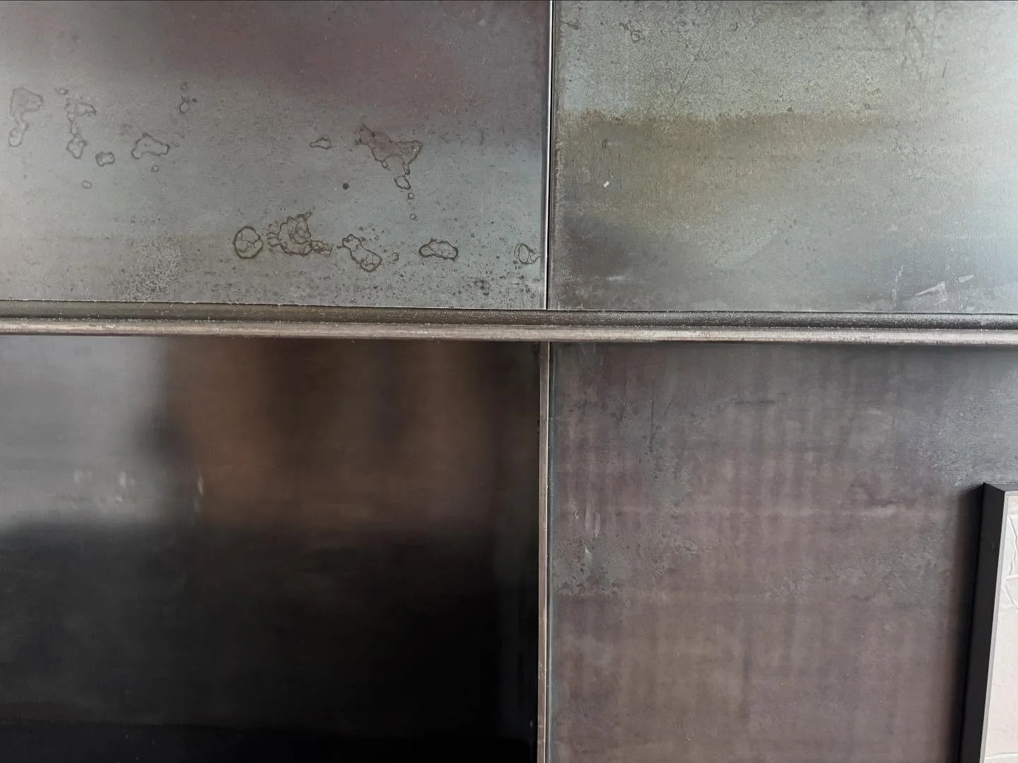 The love and magic of hot rolled steel. Steel gets a bad rap as being cold, lifeless and industrial compared to the natural beauty of wood. Our favorite finish for interior steel is black patina and oil which accentuates the natural colors and textur
