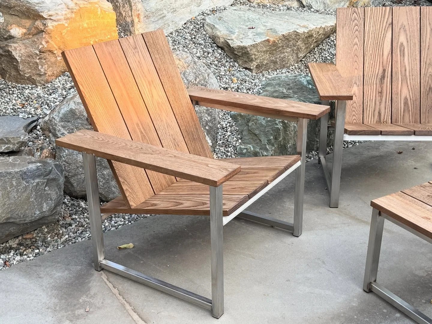 HEY!!!

We are excited to share the modern Adirondack (ADK) Chair. Stainless steel and thermally modified Ash not only look great together but are also excellent durable exterior materials. These chairs are comfortable to sit in while also easy to ge