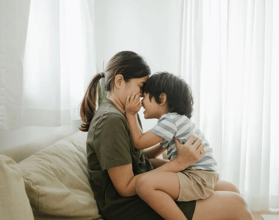 mom and son playing