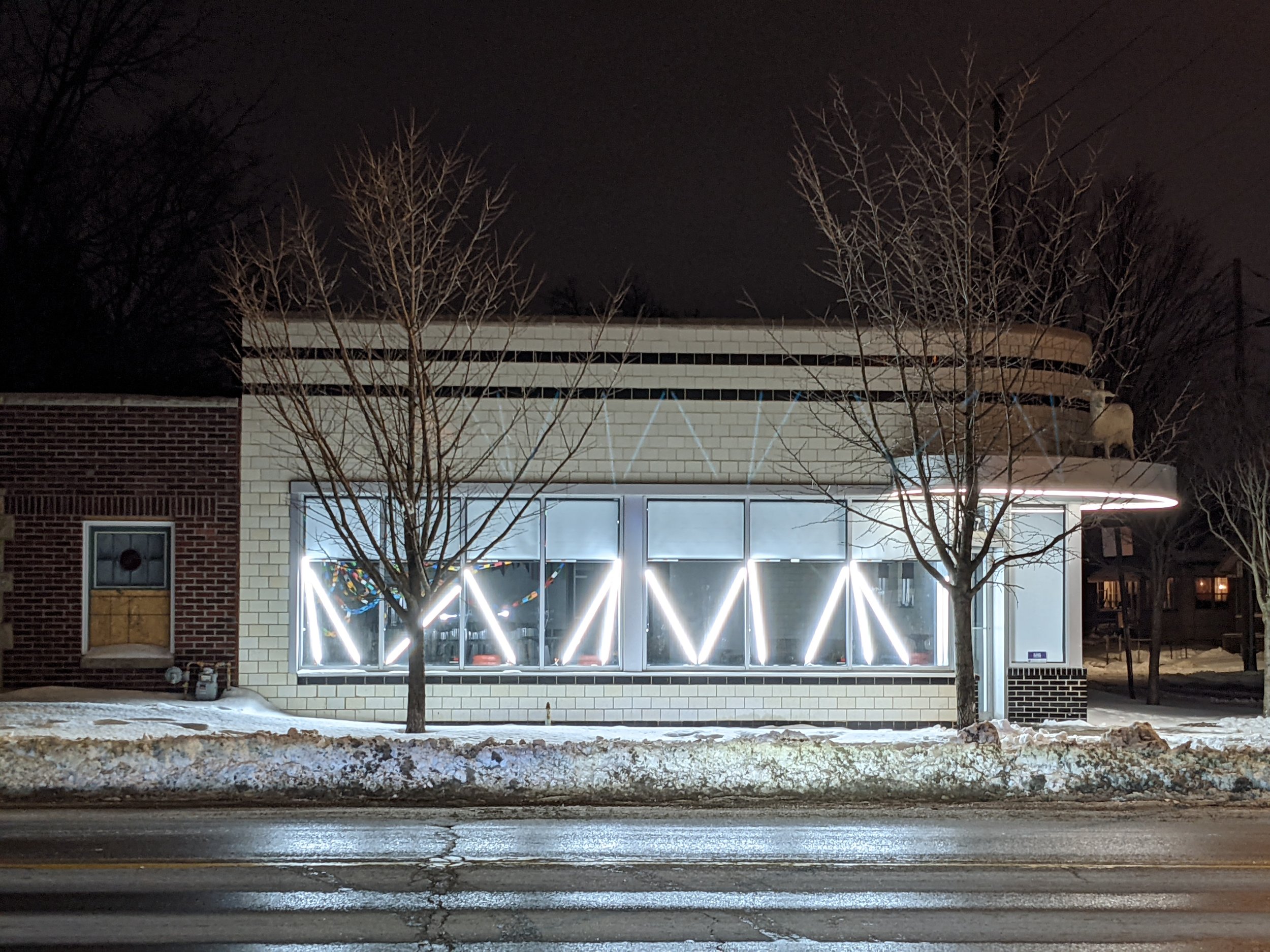 10 East Arts HUB - Quincy Ownes Window Installation.jpg