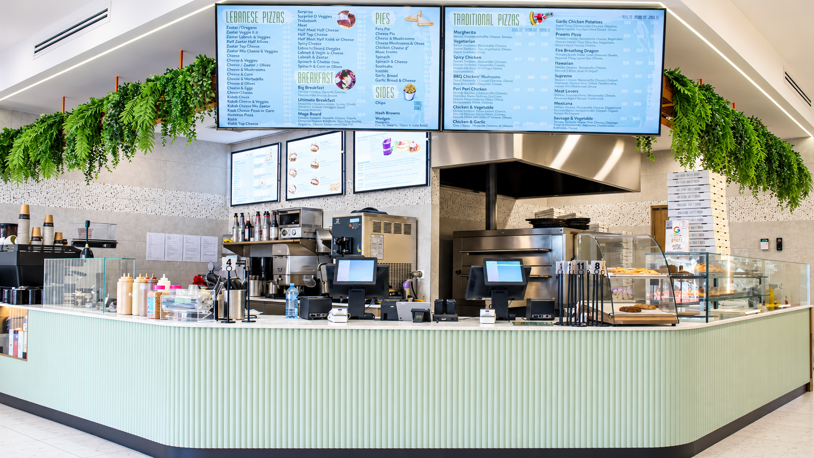 Mint Pizzeria Counter With Lush Greenery.png