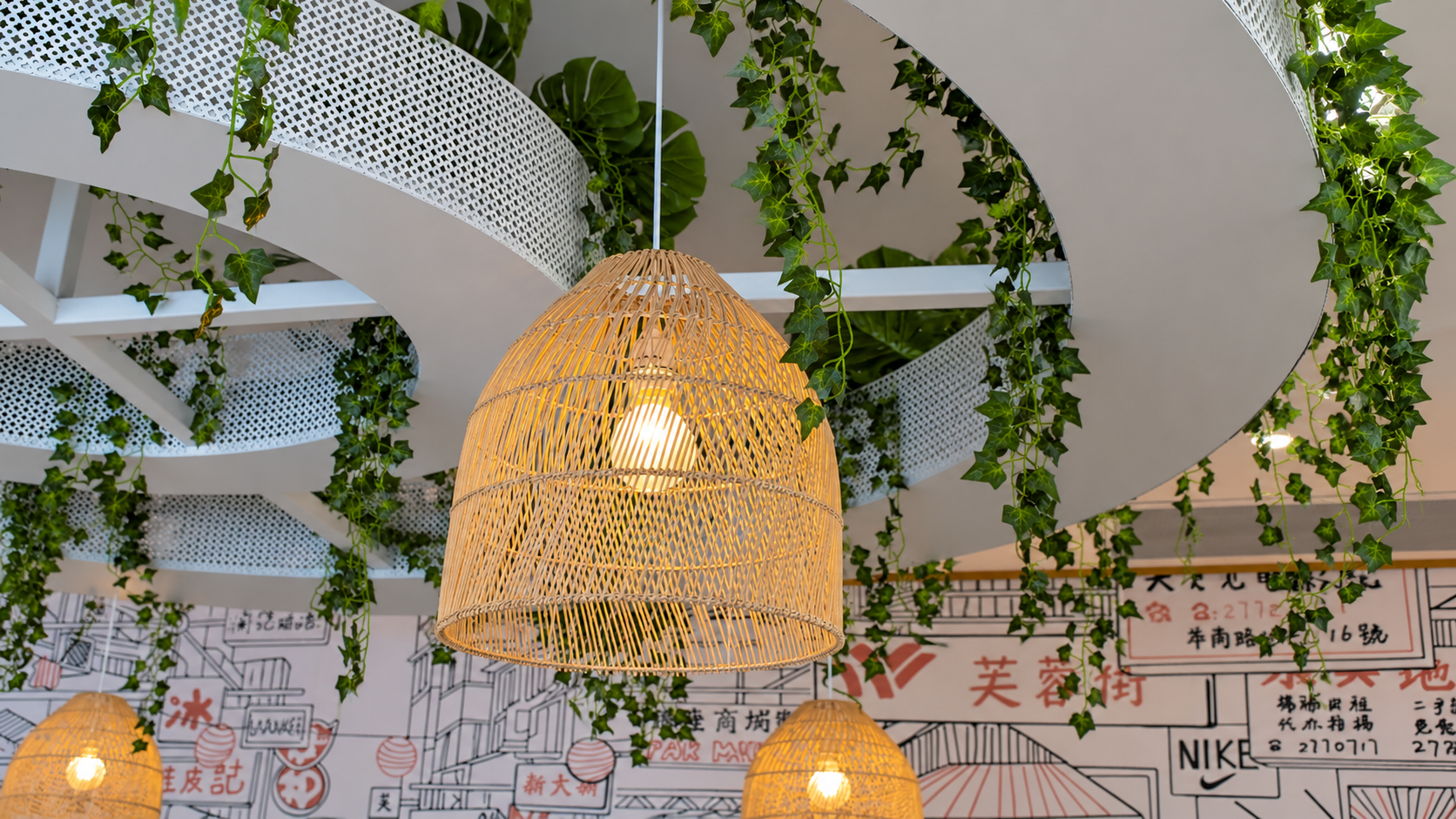 Wicker Pendant Beneath Verdant Ceiling Rings.png