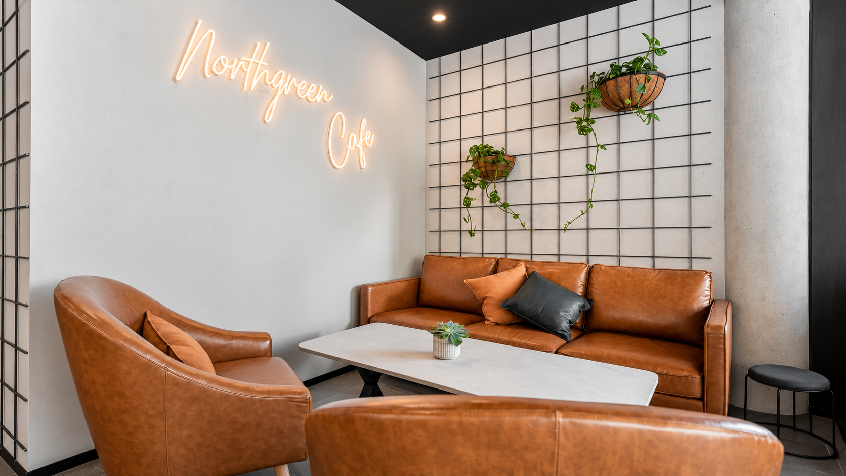 Modern Café Lounge with Neon Sign.png