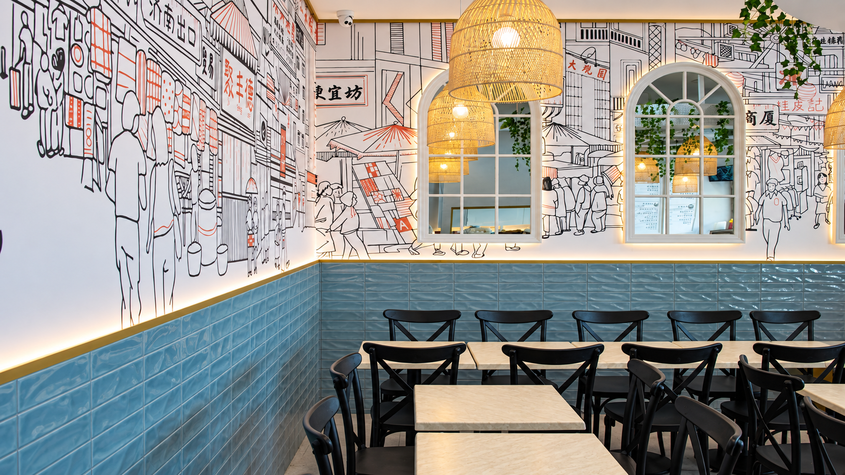 Modern Café with Asian Street Mural.png