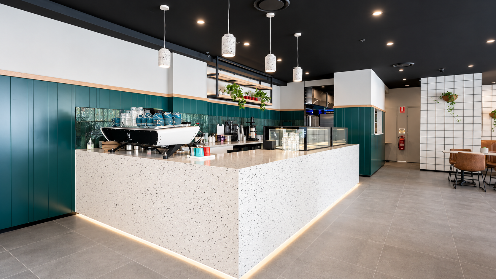 Modern Teal Terrazzo Café Interior.png