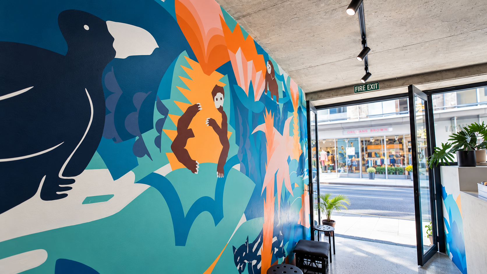 Vibrant Mural Entrance to Empty Street.png