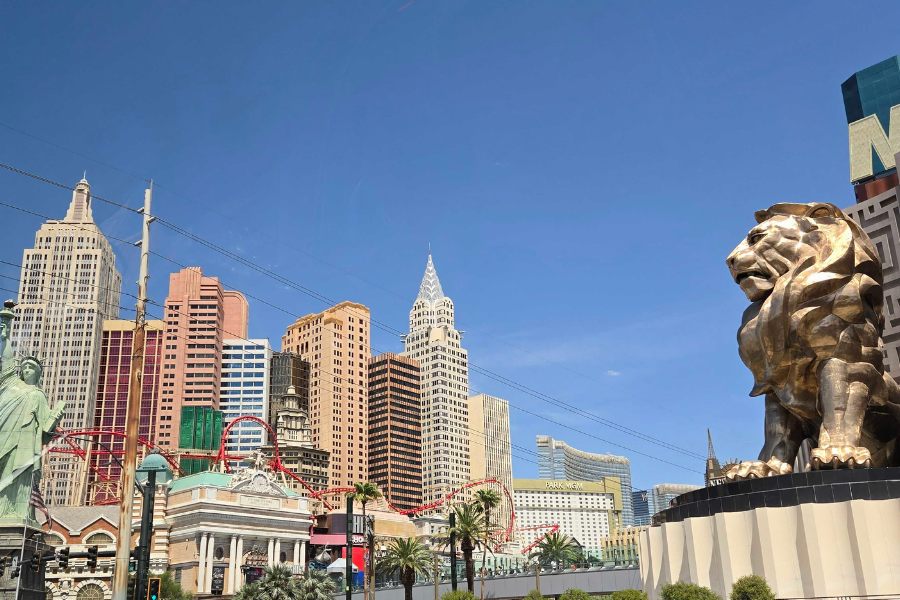 Street view of Las Vegas Blvd showing MGM hotel lion and New York New York hotel Statue of Liberty