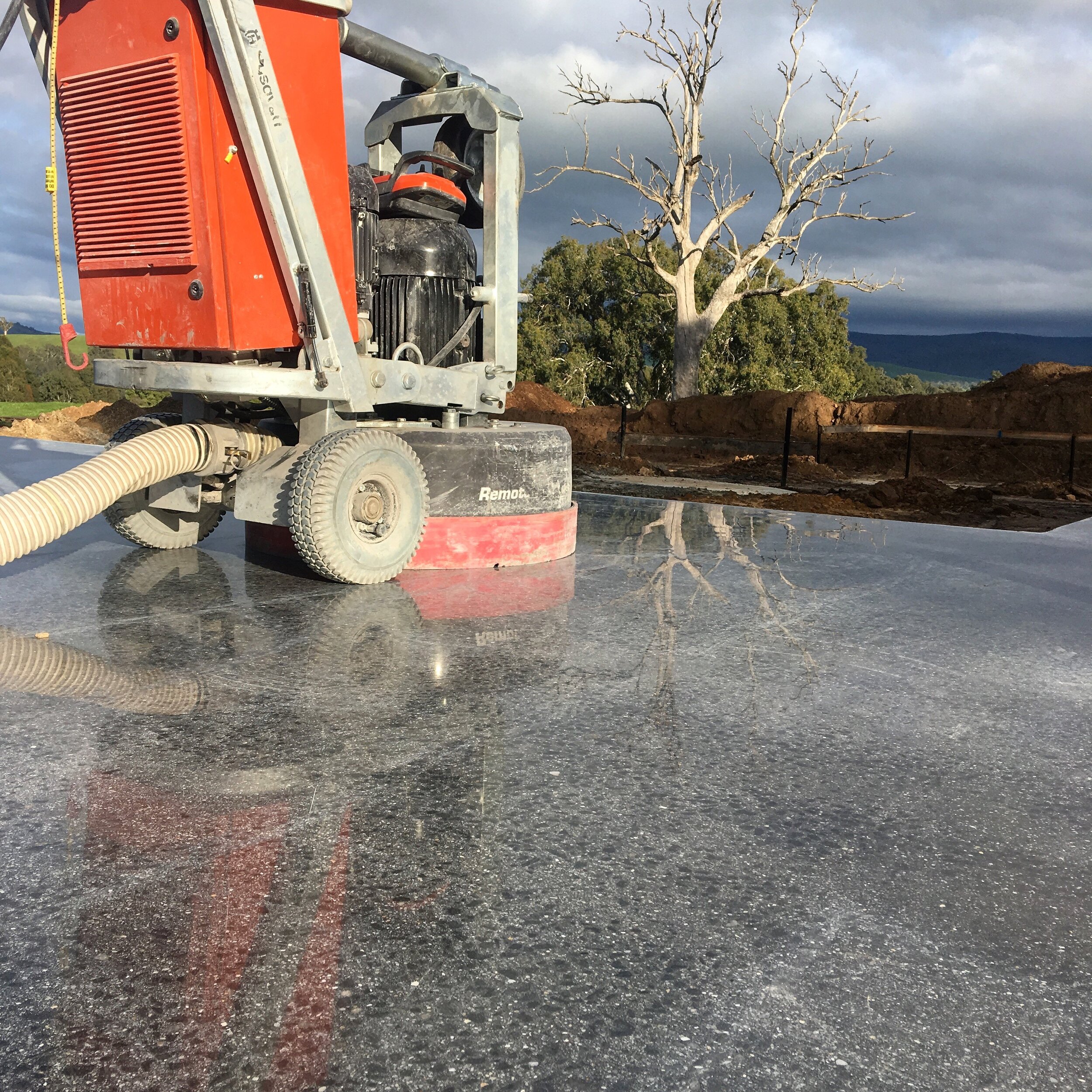 Polsihed concrete with custom mix, full exposure 400grit (not at full gloss in this pic) Maybe hero picture.jpg