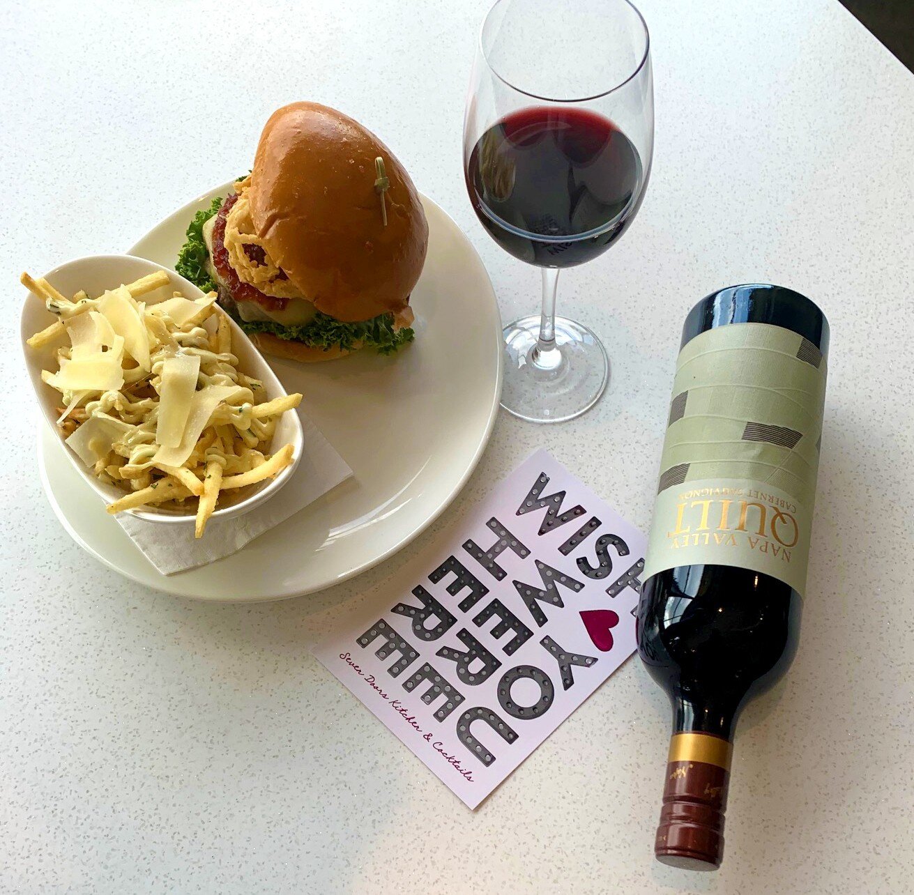 Unwind and indulge in the ultimate midweek treat at Seven Doors Restaurant with Wine Wednesday! 🍷 Savor every bite of our delectable 70/30 burger paired perfectly with truffle fries, all while enjoying your favorite glass of wine. It's a feast for t