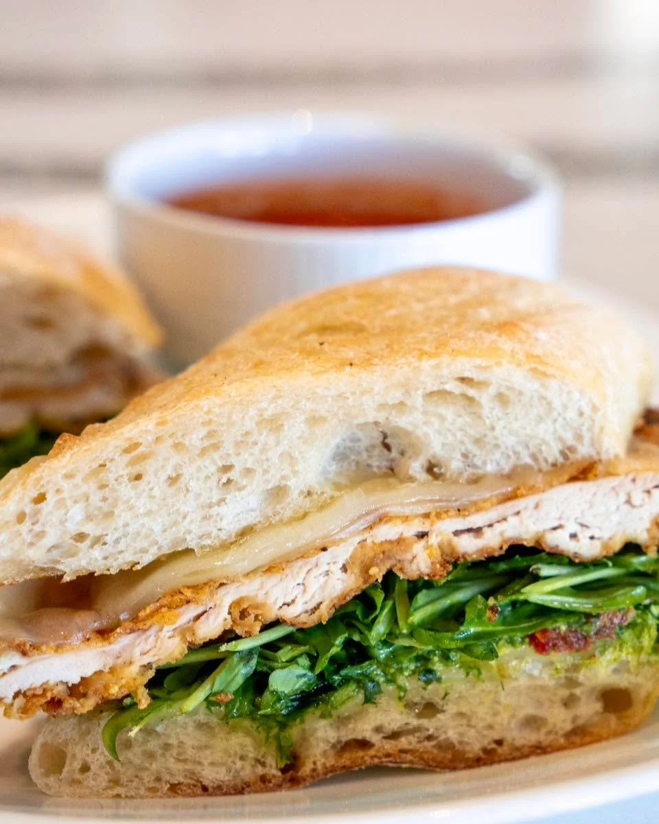 The kind of sandwich you think about long after the last bite 🤌 Crispy parmesan chicken, fresh arugula, sunflower pesto, and marinara for the perfect finish.

#chickenparm #dallas