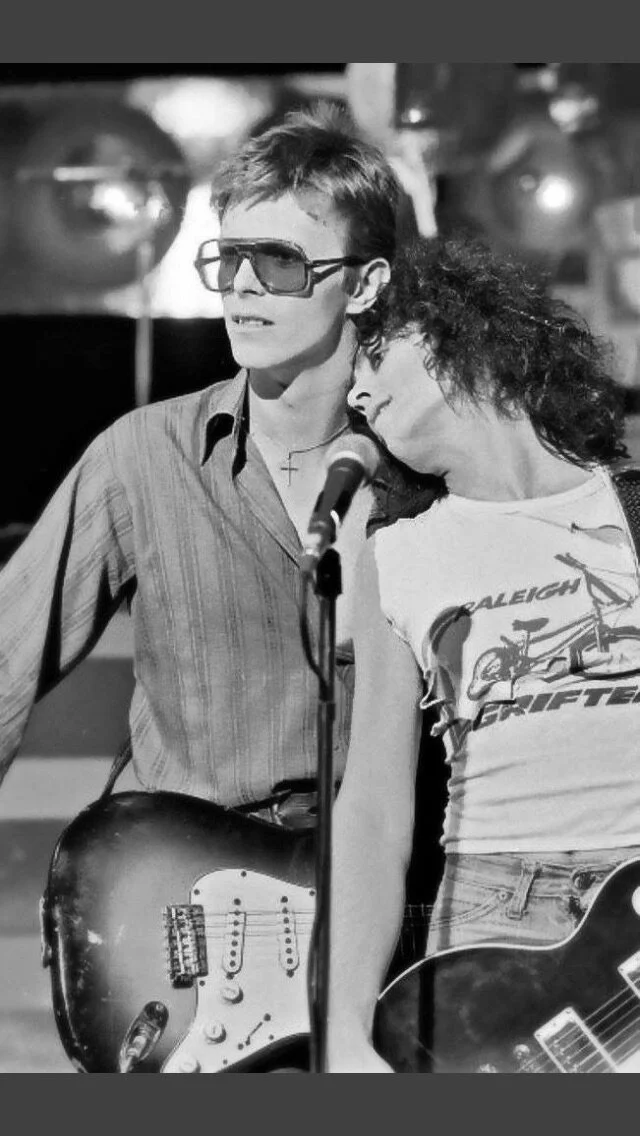 Standing Next To You