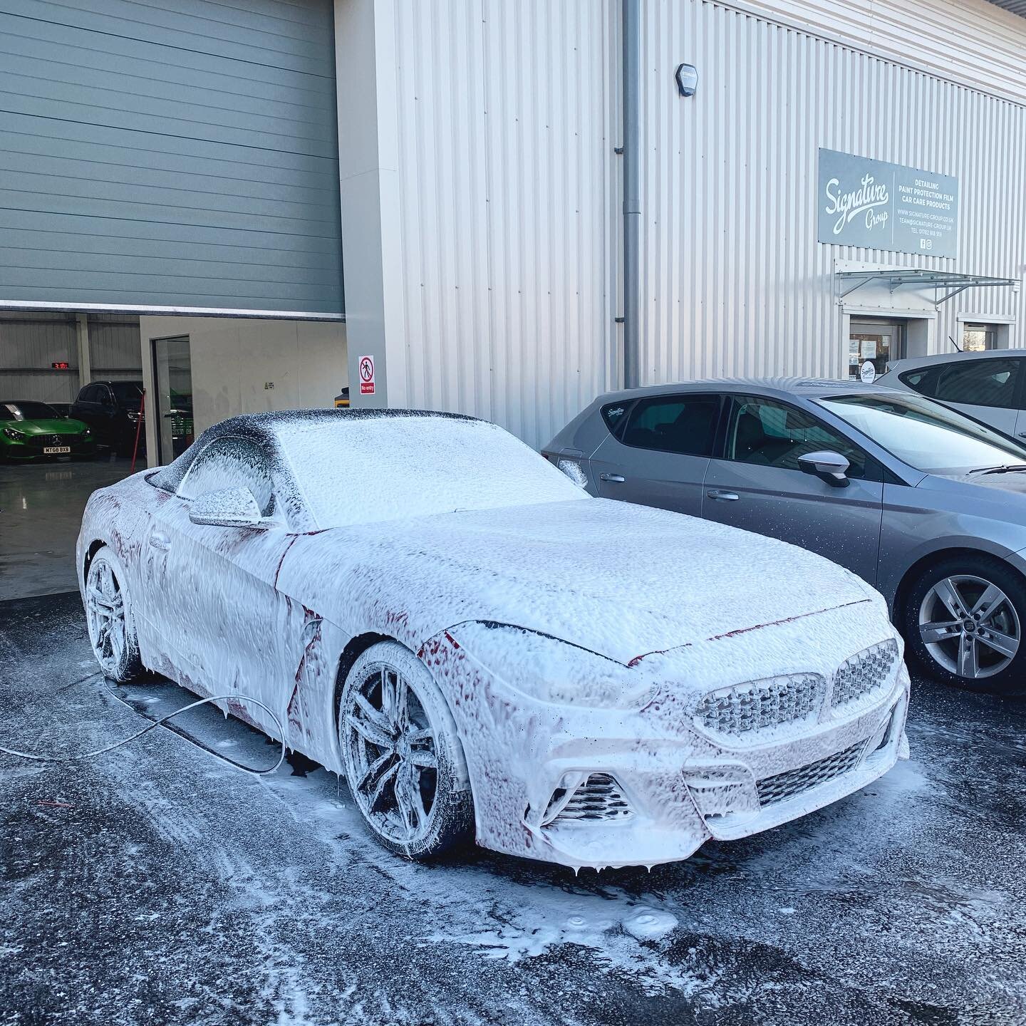 BMW Z4 M440i received @xpel paint protection film and bathing in our Candy Apple Snow Foam as part of our full wash and decontamination stages. #signaturegroup #ppf #detailing #bmw #z4 #m440i #paintprotectionfilm #xpel