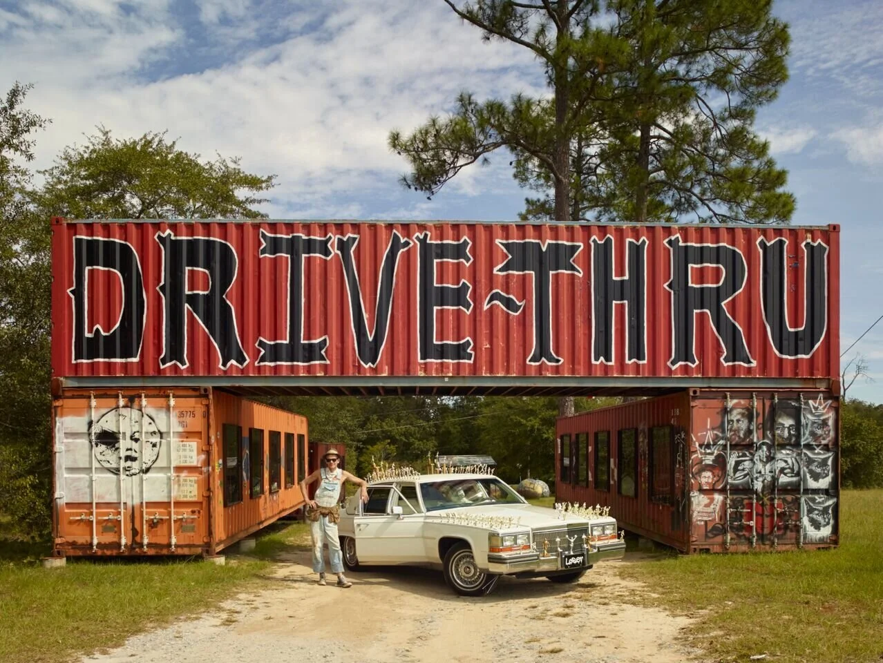 Butch at the entrance to his ‘drive-thru’ museum