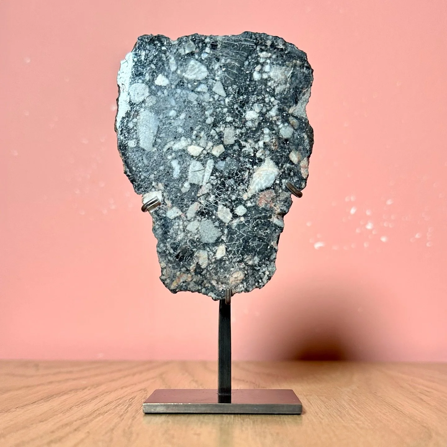 Discovered in 2021 in Libya, Adjabiya 001 was a collection of rare lunar meteorites weighing an impressive 28.8kg in total. Due to their remarkable size, slices, like that seen above, were created in order to witness the stunning interior better. The
