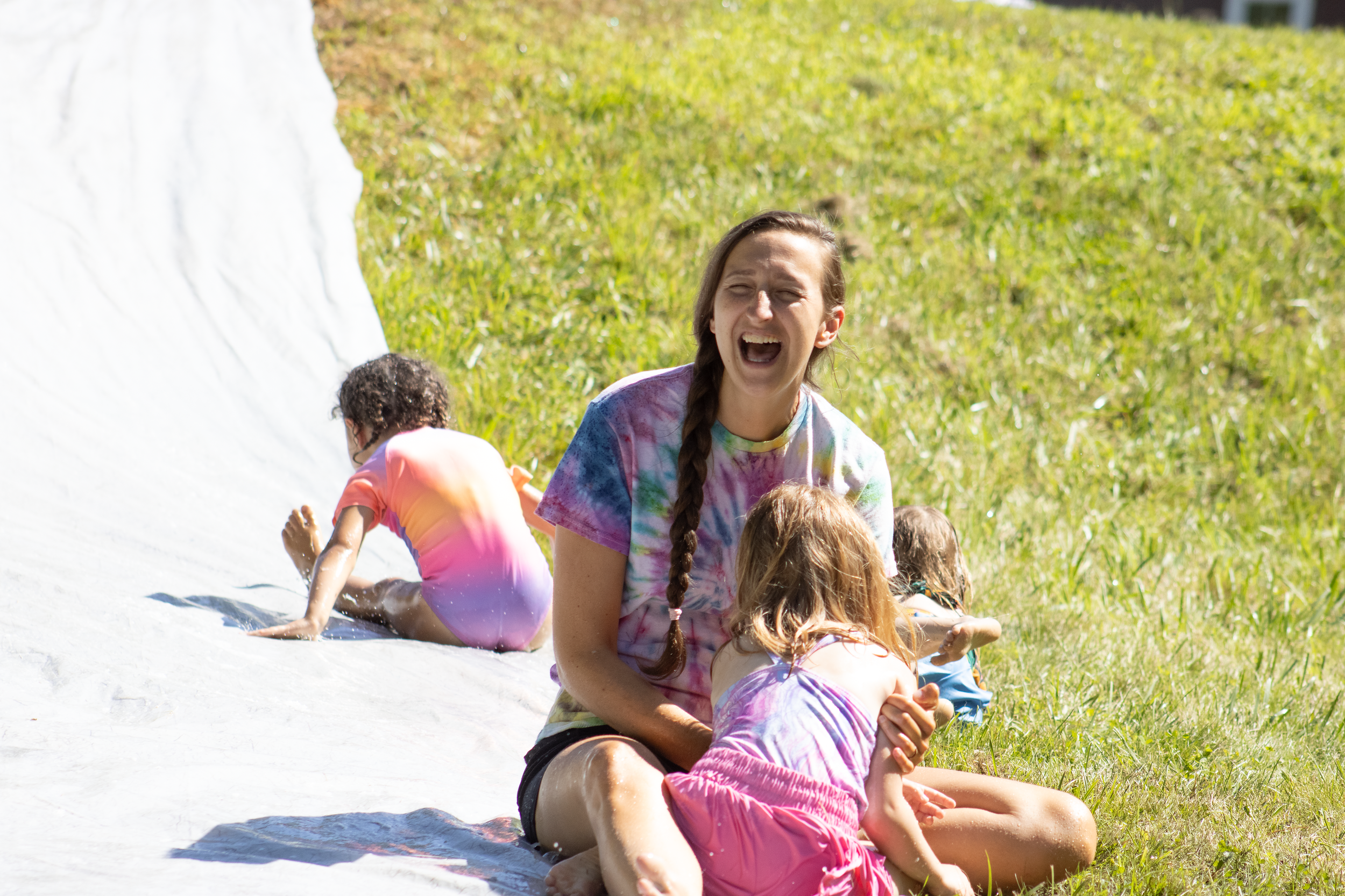 2026SlipNSlideFamilyCampMomSmilesLaugh_MG_8633-X5 (1).png