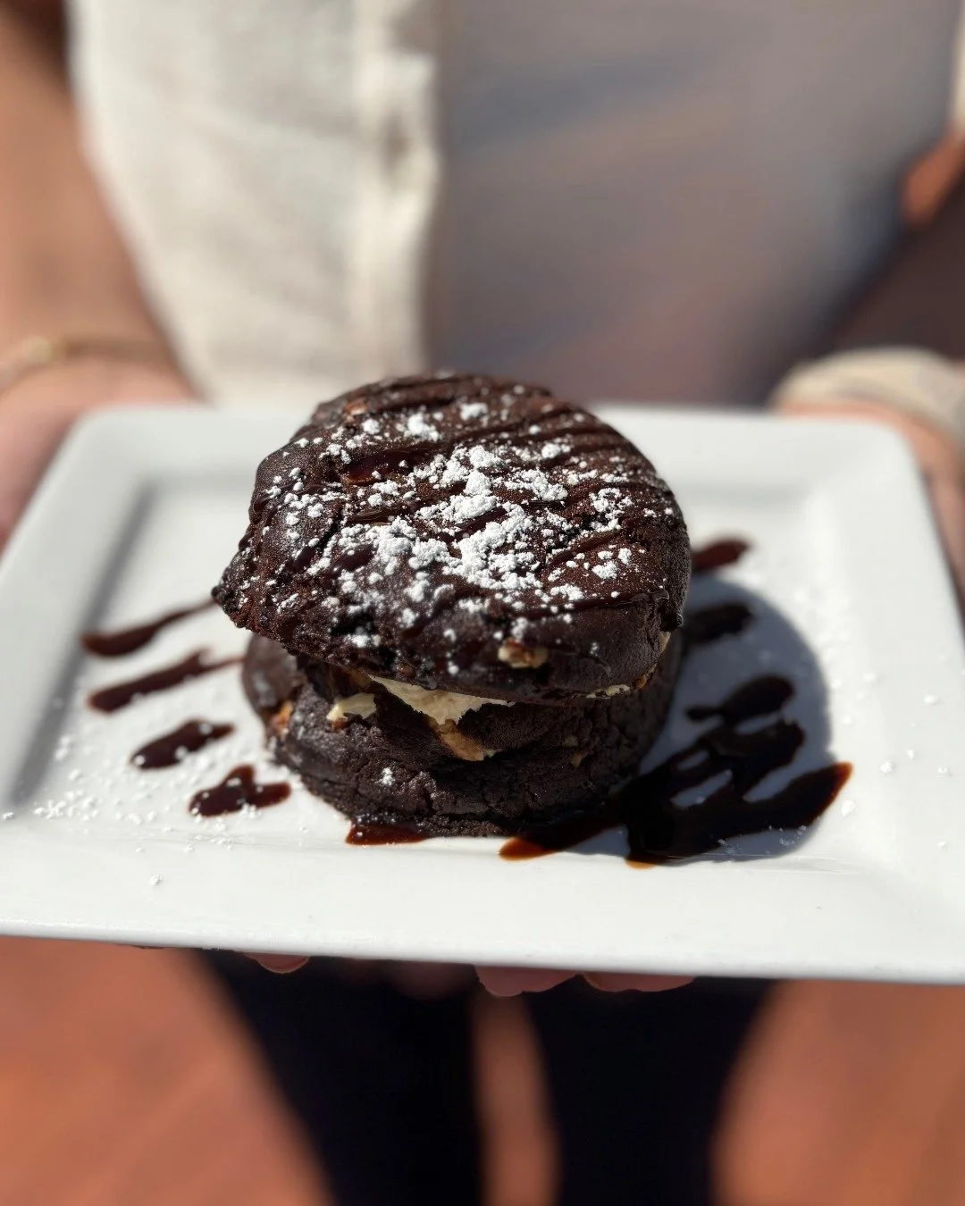 Whipped espresso cream sandwiched between two warm triple chocolate chip cookies >>> 

Try the OMG today 🤎