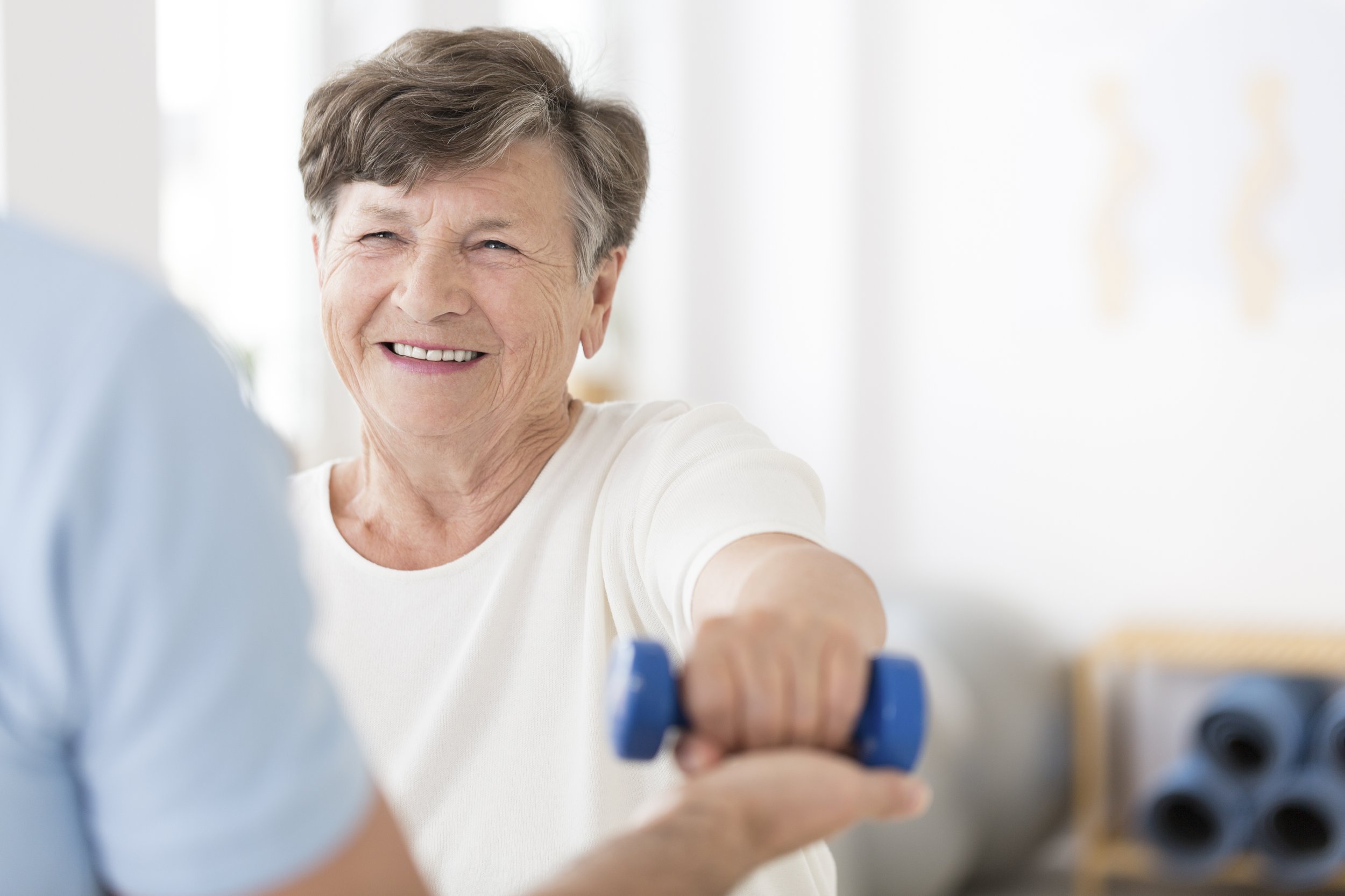 senior-woman-exercising-with-weights-2021-08-26-15-45-25-utc.jpg