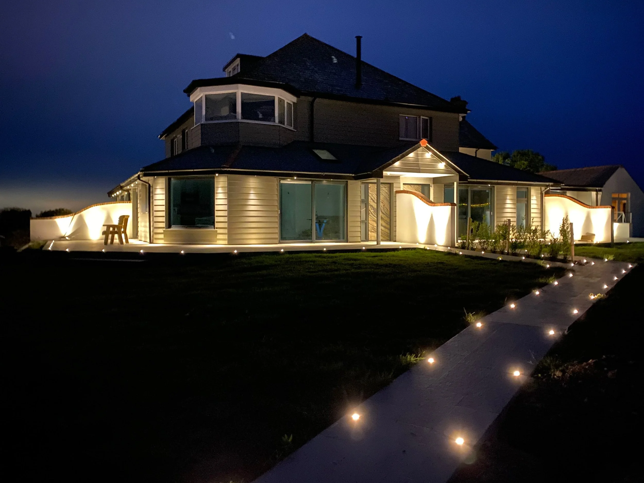 The View accommodation at night with ground lighting