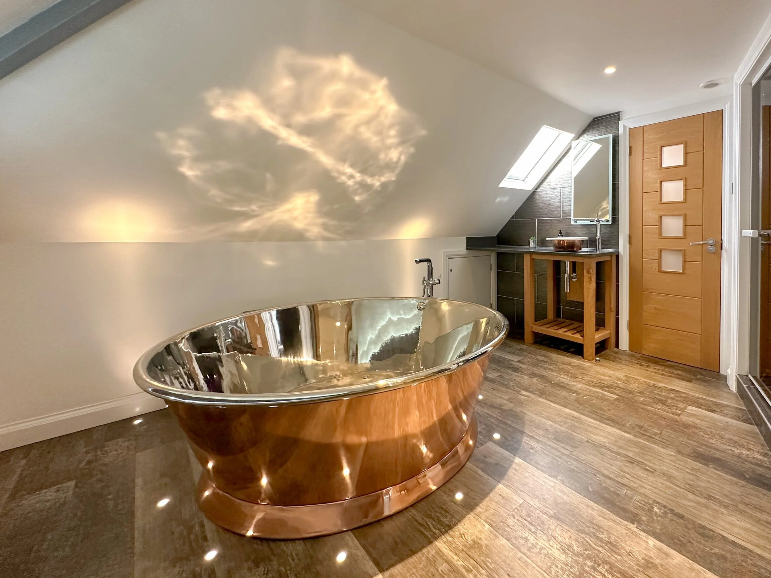 Copper air-spa bath with nickel interior