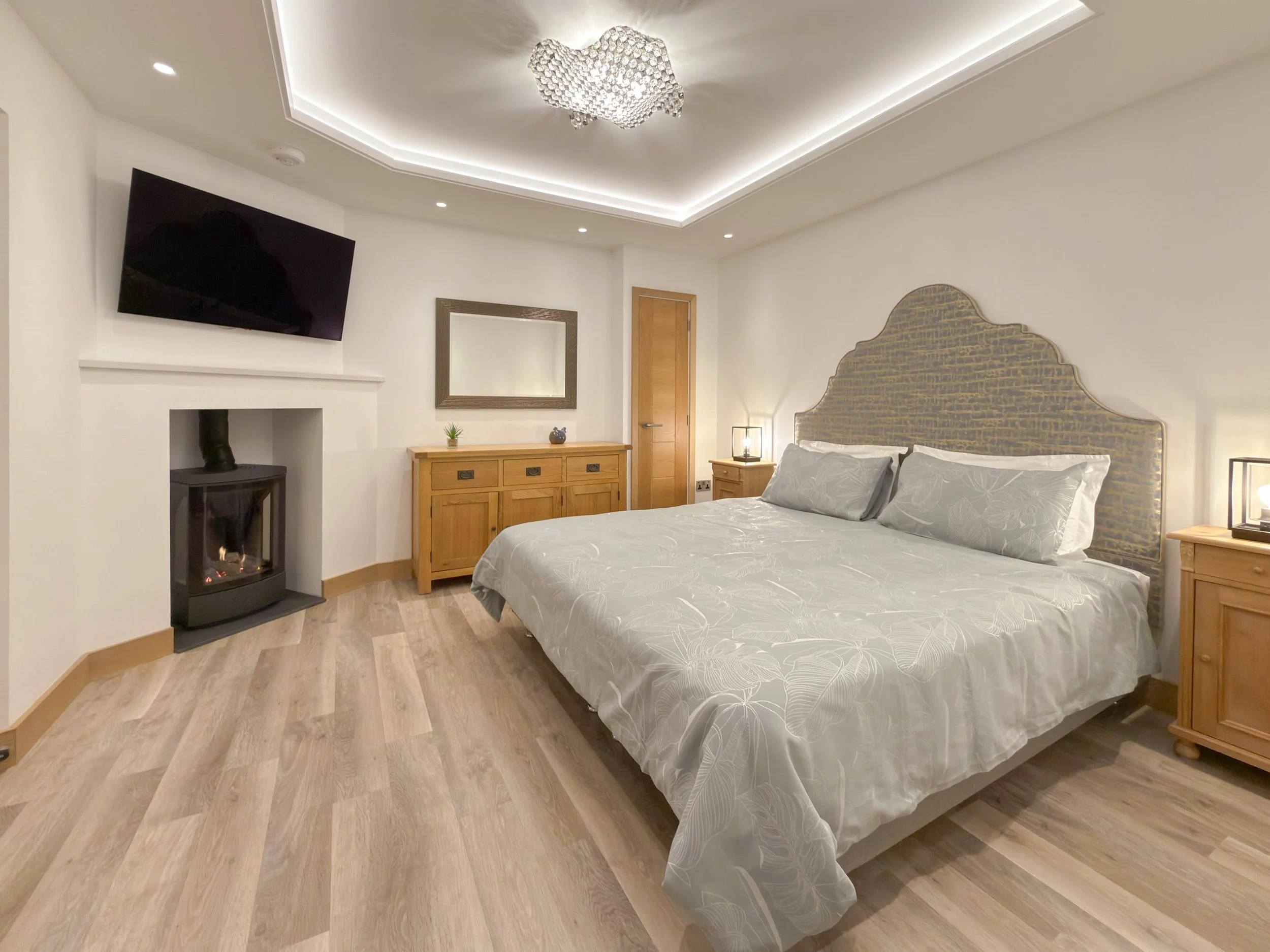 Super-king size bed with fireplace