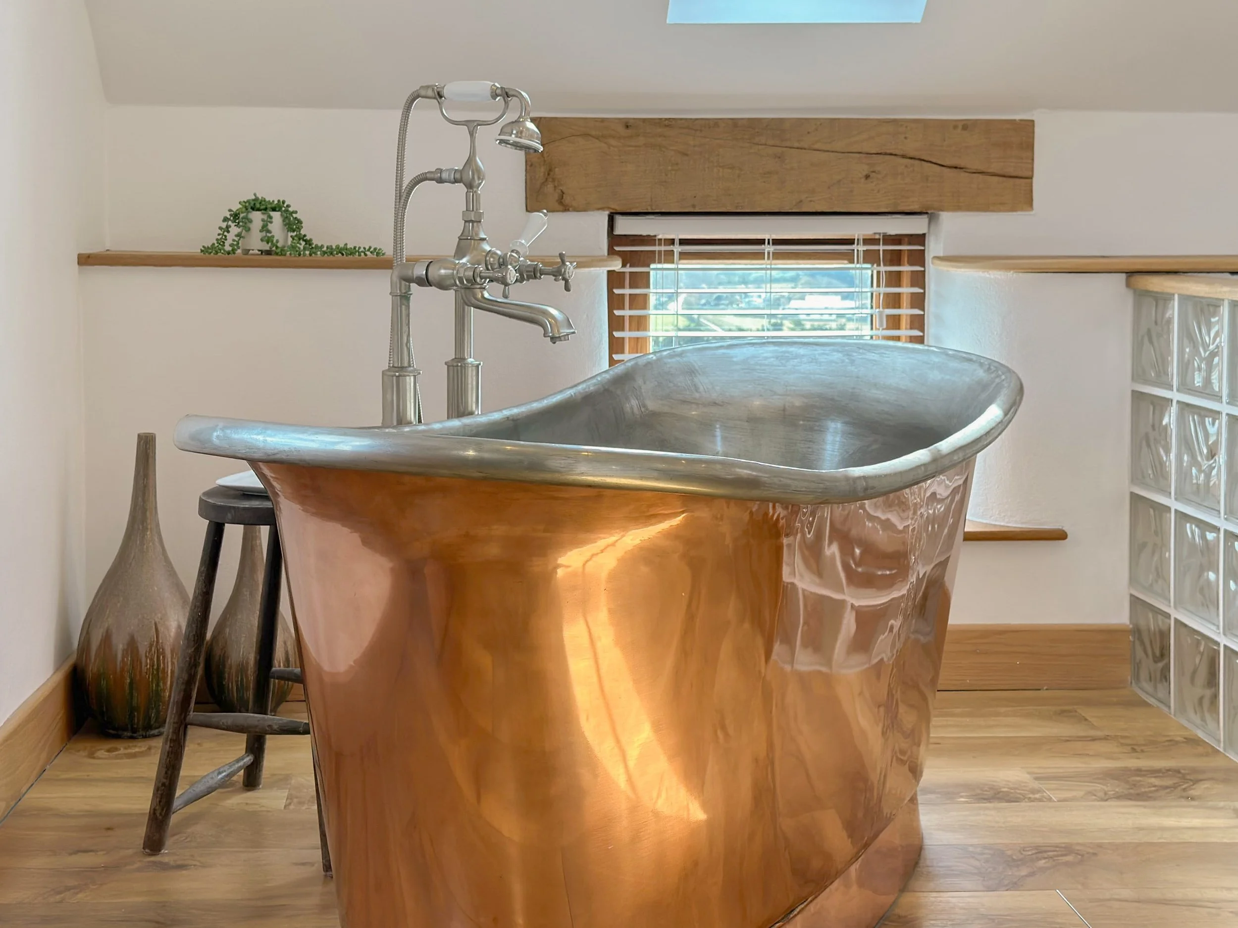 Copper bath with tin interior