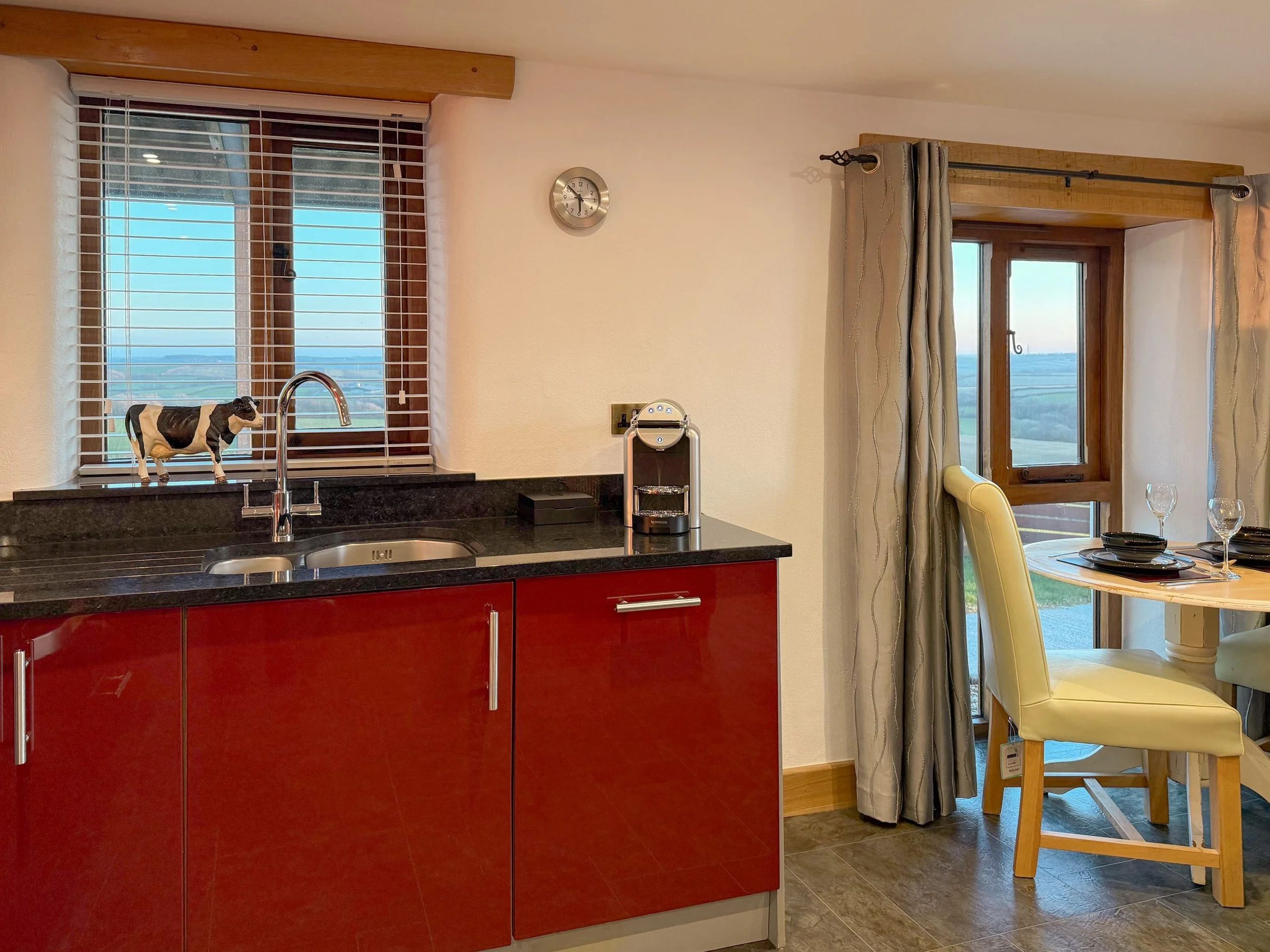 Boston red gloss kitchen with Nespresso machine