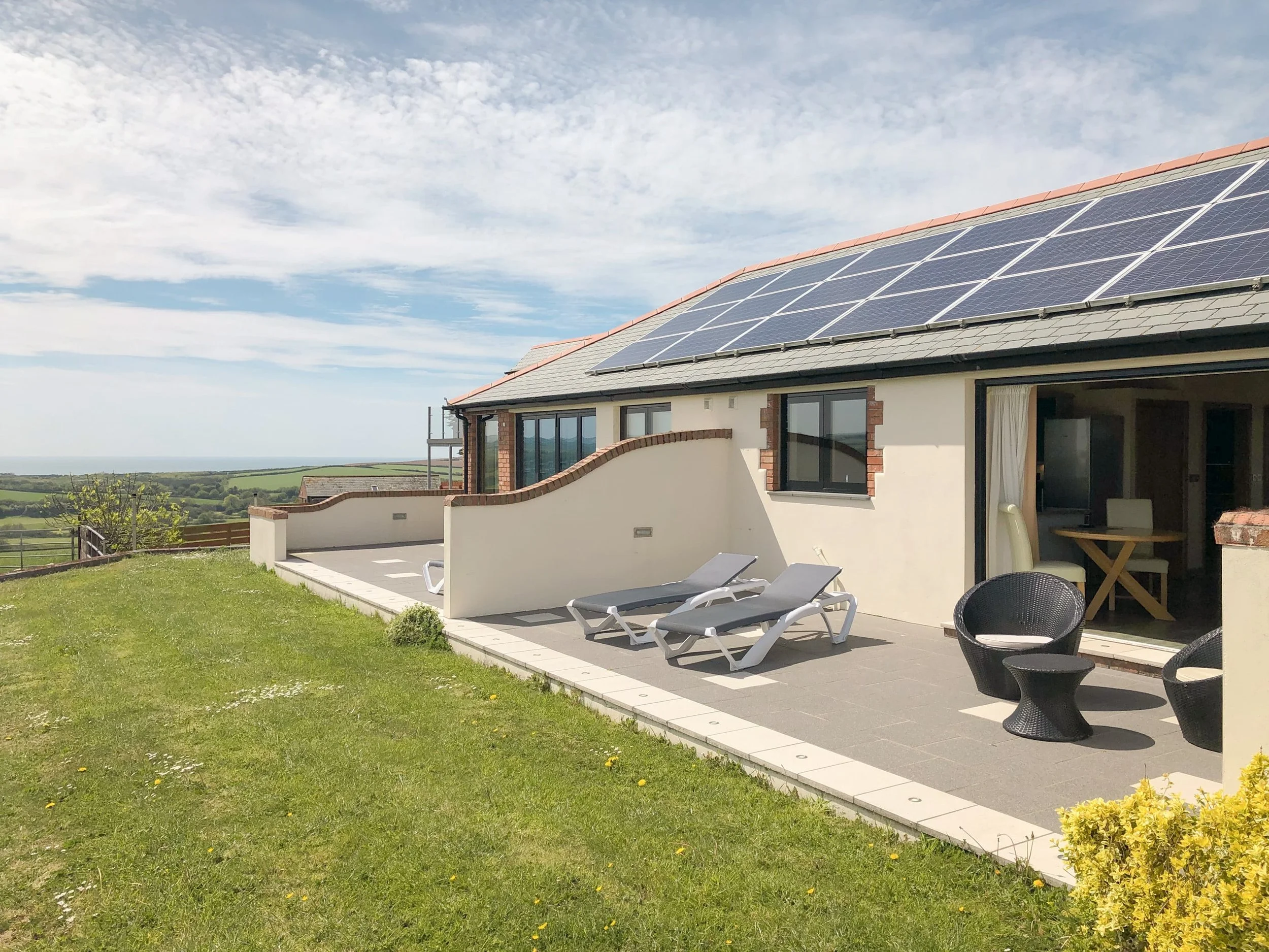 Patio area of the Milky Way apartment with rolling countryside views