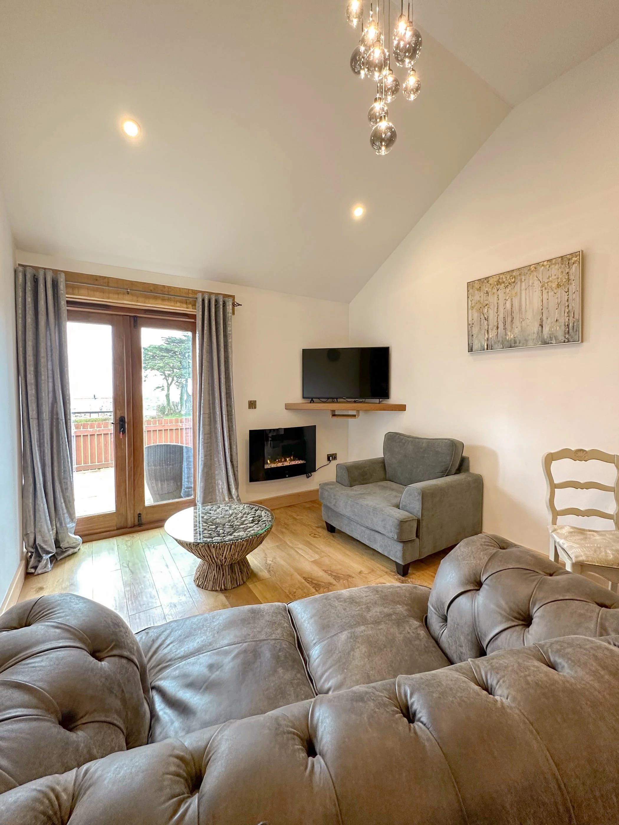 Open plan living area with sea views