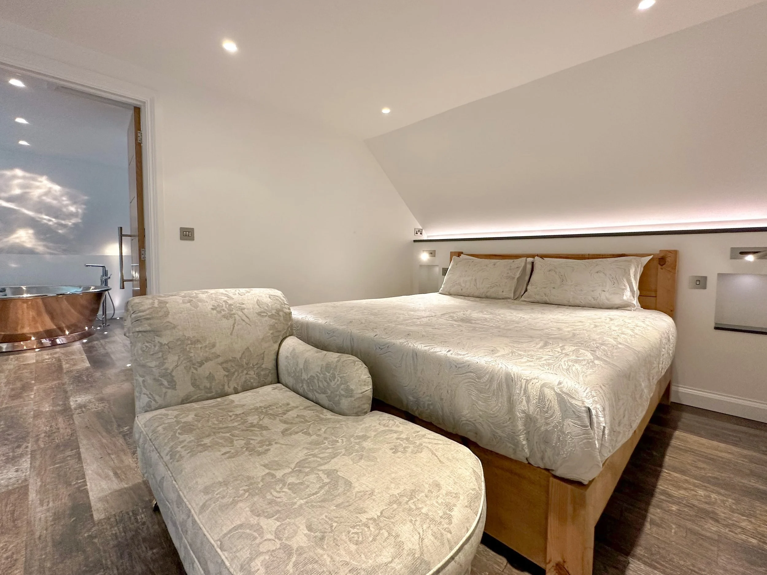 Skyfall super-king size loft bed and copper air-spa bath