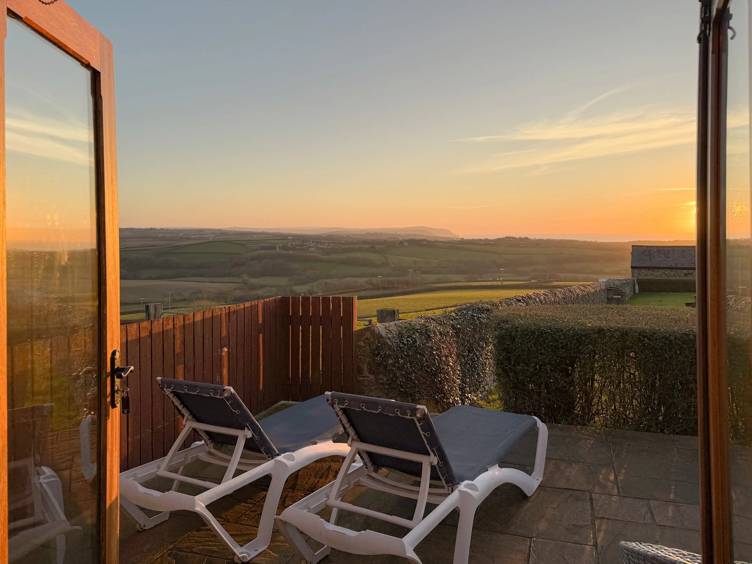 Sunset from the patio area and sun loungers
