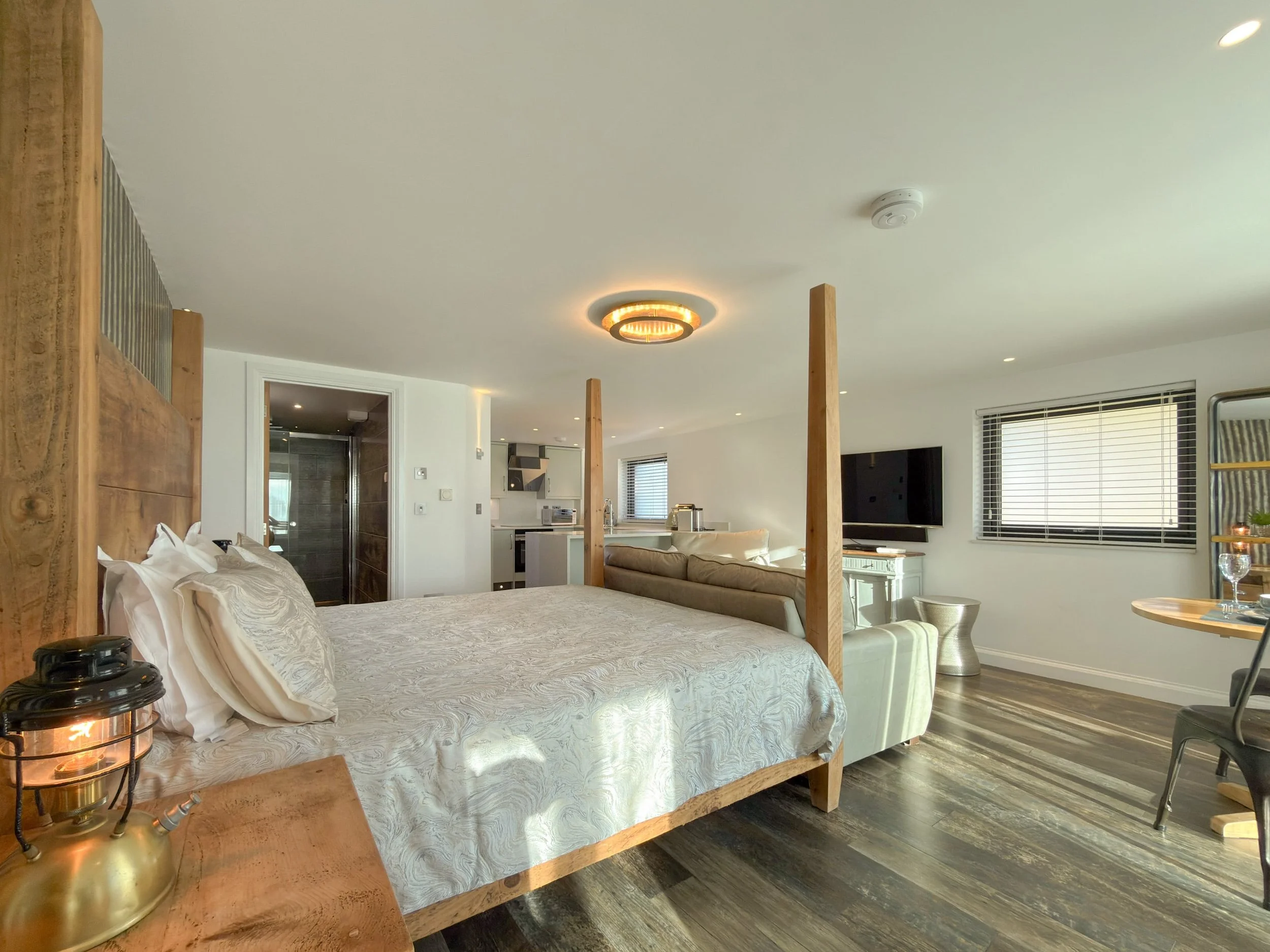 Super-king four poster plank bed